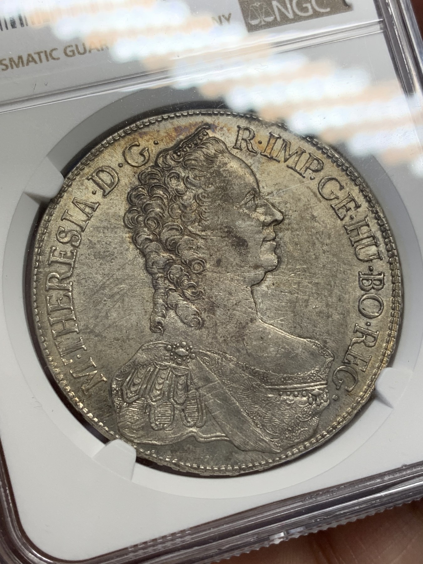 《竞宝斋》第215场-周日，周一 2场 (全场包邮) NGC-UNC 神圣罗马帝国 1765 1泰勒 玛丽亚特蕾莎大银币 维也纳造币厂 淡金彩 正面表面极浅划痕