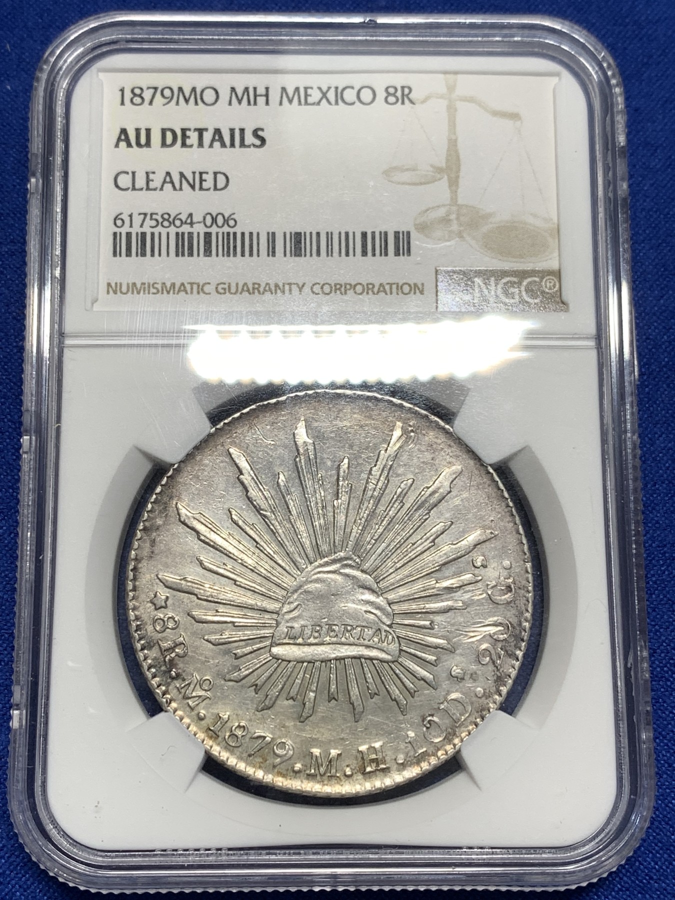 《竞宝斋》第215场-周日，周一 2场 (全场包邮) NGC AUD 墨西哥1879年鹰洋8R银币，图案整洁，齿边花纹依稀可见。