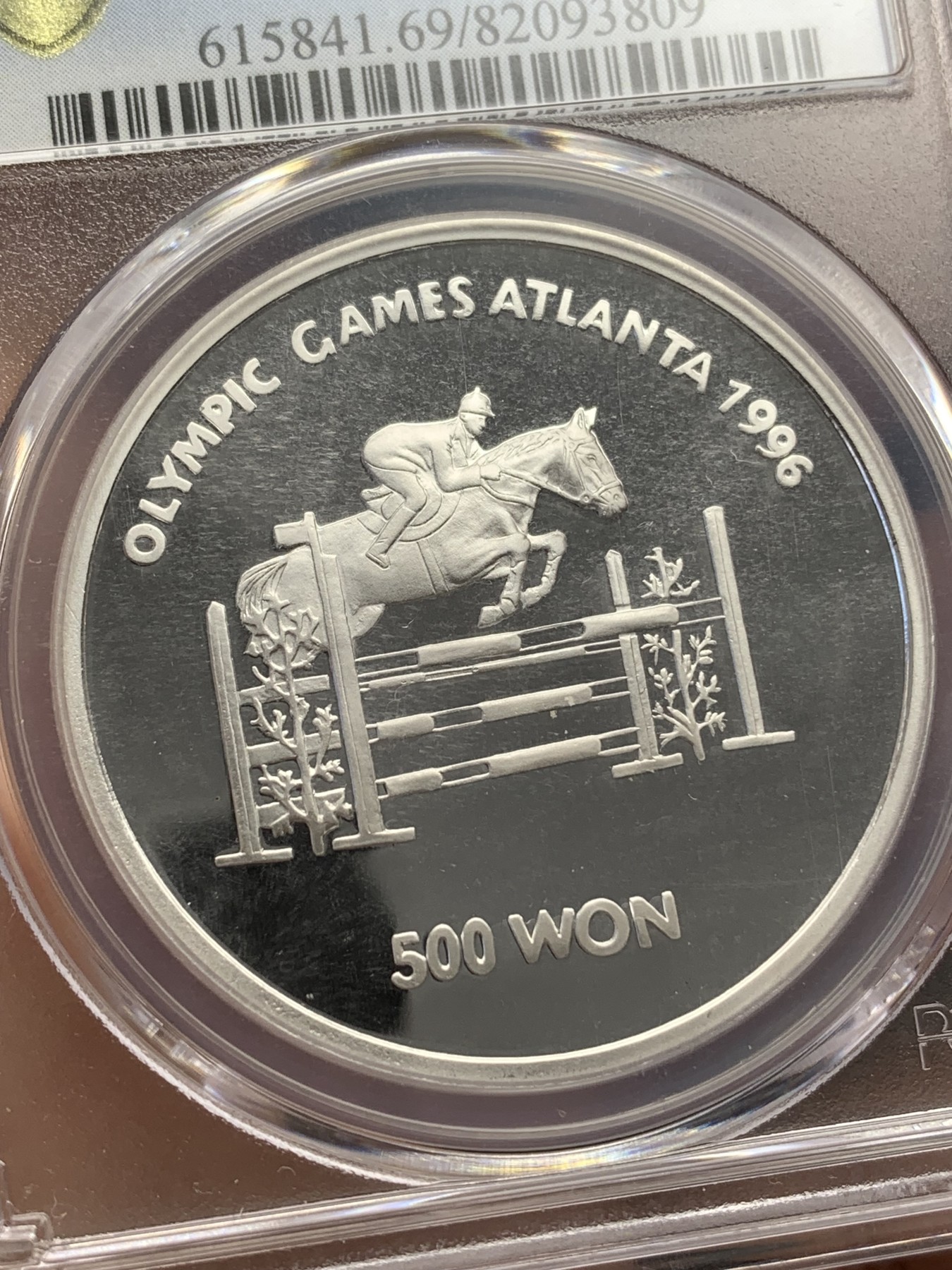 《竞宝斋》第215场-周日，周一 2场 (全场包邮) PCGS PR69 1995年朝鲜发行奥运会马术，中央版大银币，非常难得！