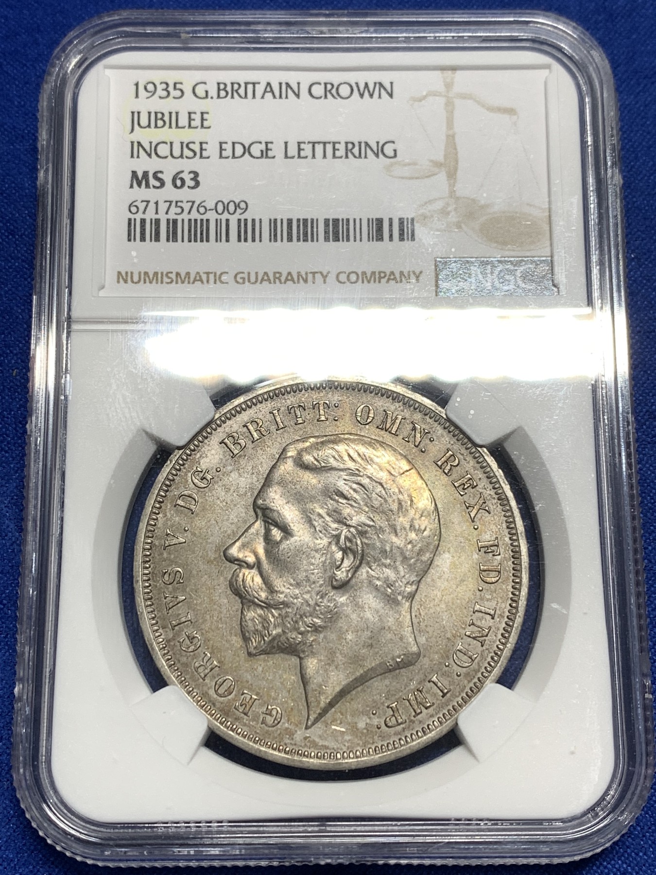 《竞宝斋》第215场-周日，周一 2场 (全场包邮) NGC-MS63 英国1935年乔治五世1克朗木马剑大银币，图案精美，英系热门品种之一，玩家配版必备。原汁原味老包浆，状态极佳，非常漂亮。