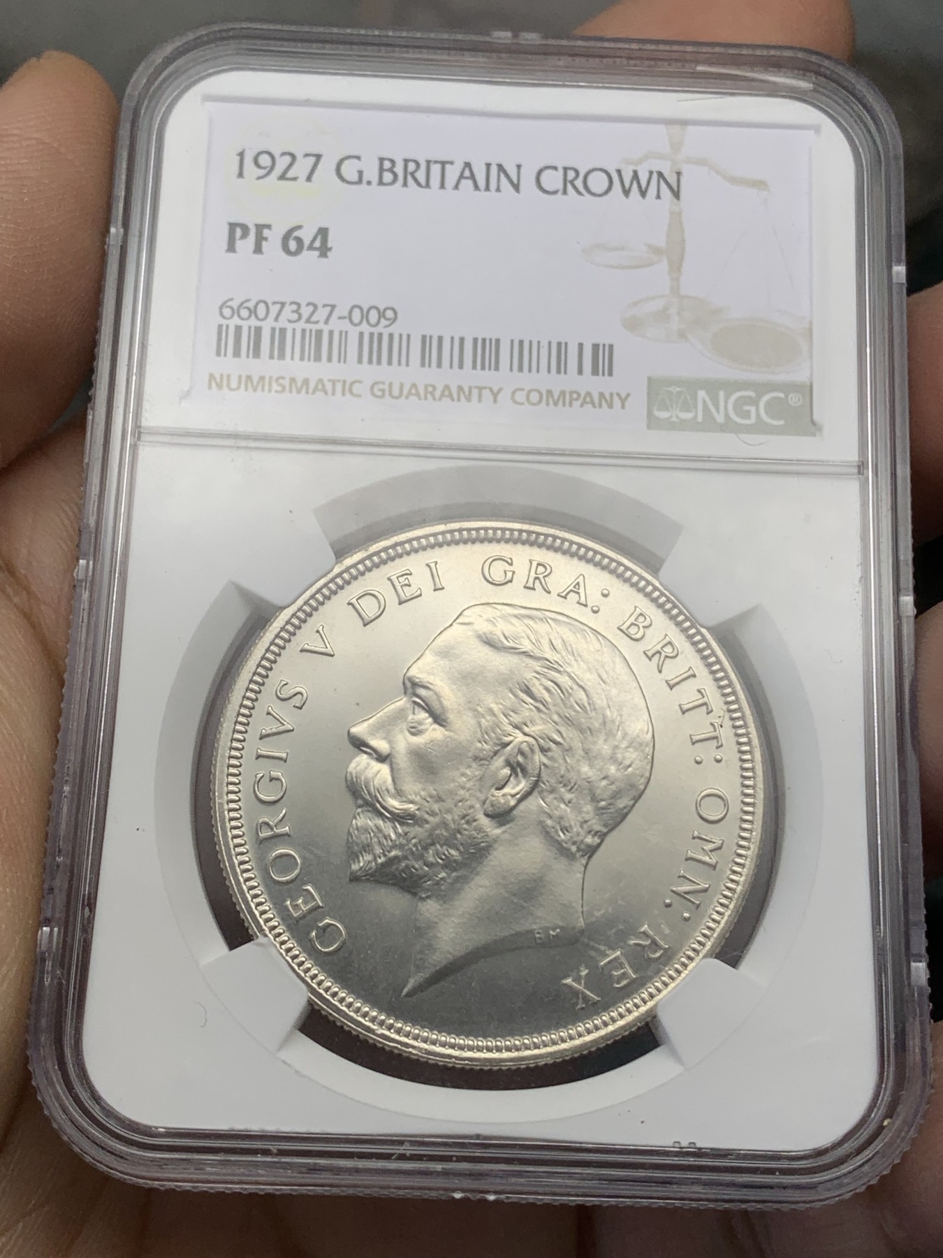 《竞宝斋》第215场-周日，周一 2场 (全场包邮) NGC PF64 英国1927年乔治五世精制花冠一克朗银币，精制镜面