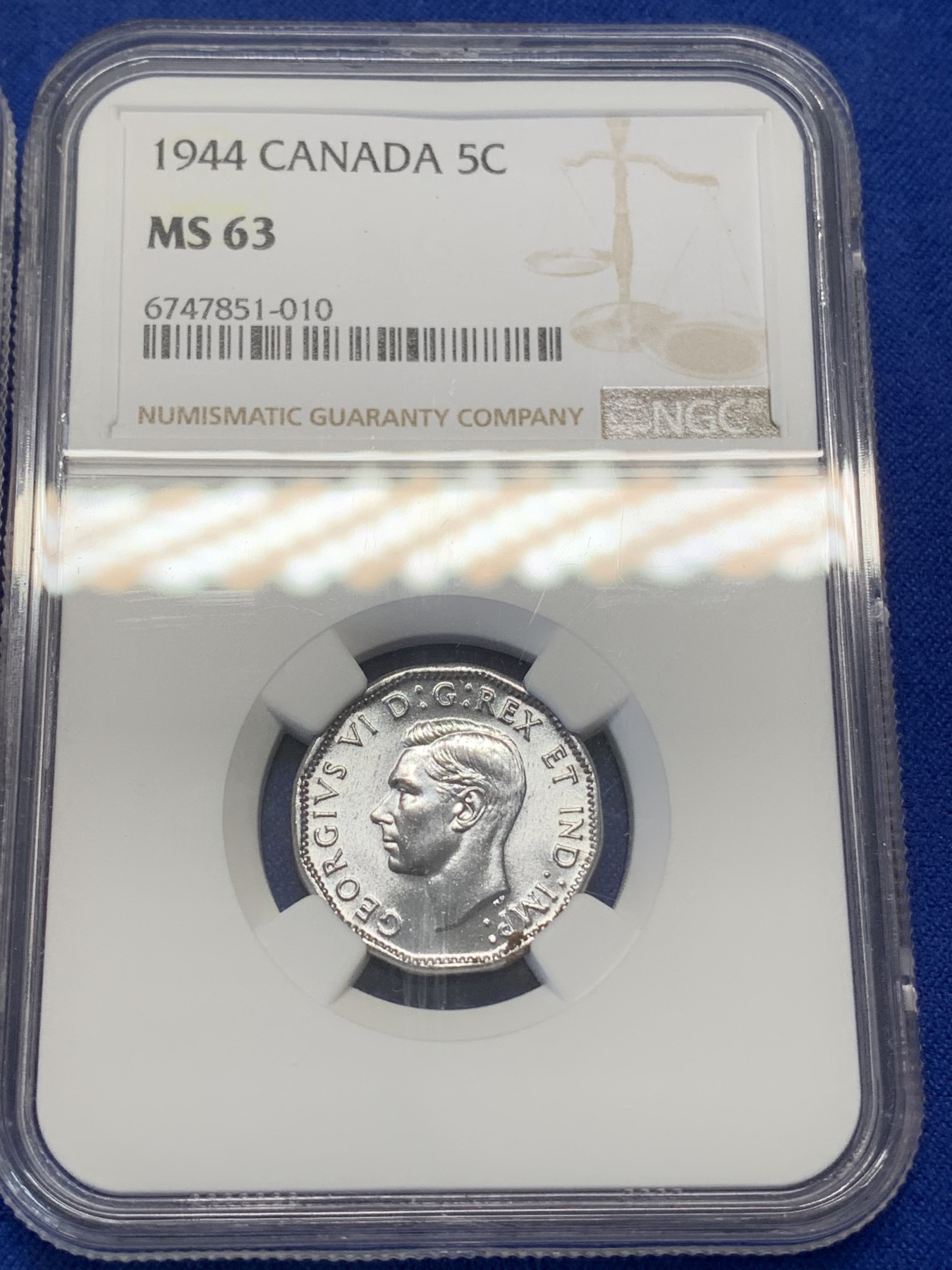 《竞宝斋》第215场-周日，周一 2场 (全场包邮) 两枚一组 NGC-MS63 圣马力诺1938年5分铜币，铜光好品+NGC-MS63 加拿大1944乔六5分，转光好品低评，含铁易锈不容易出分