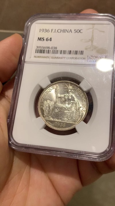 《竞宝斋》第215场-周日，周一 2场 (全场包邮) NGC MS64 法属印支 1936年 50分 淡彩包浆