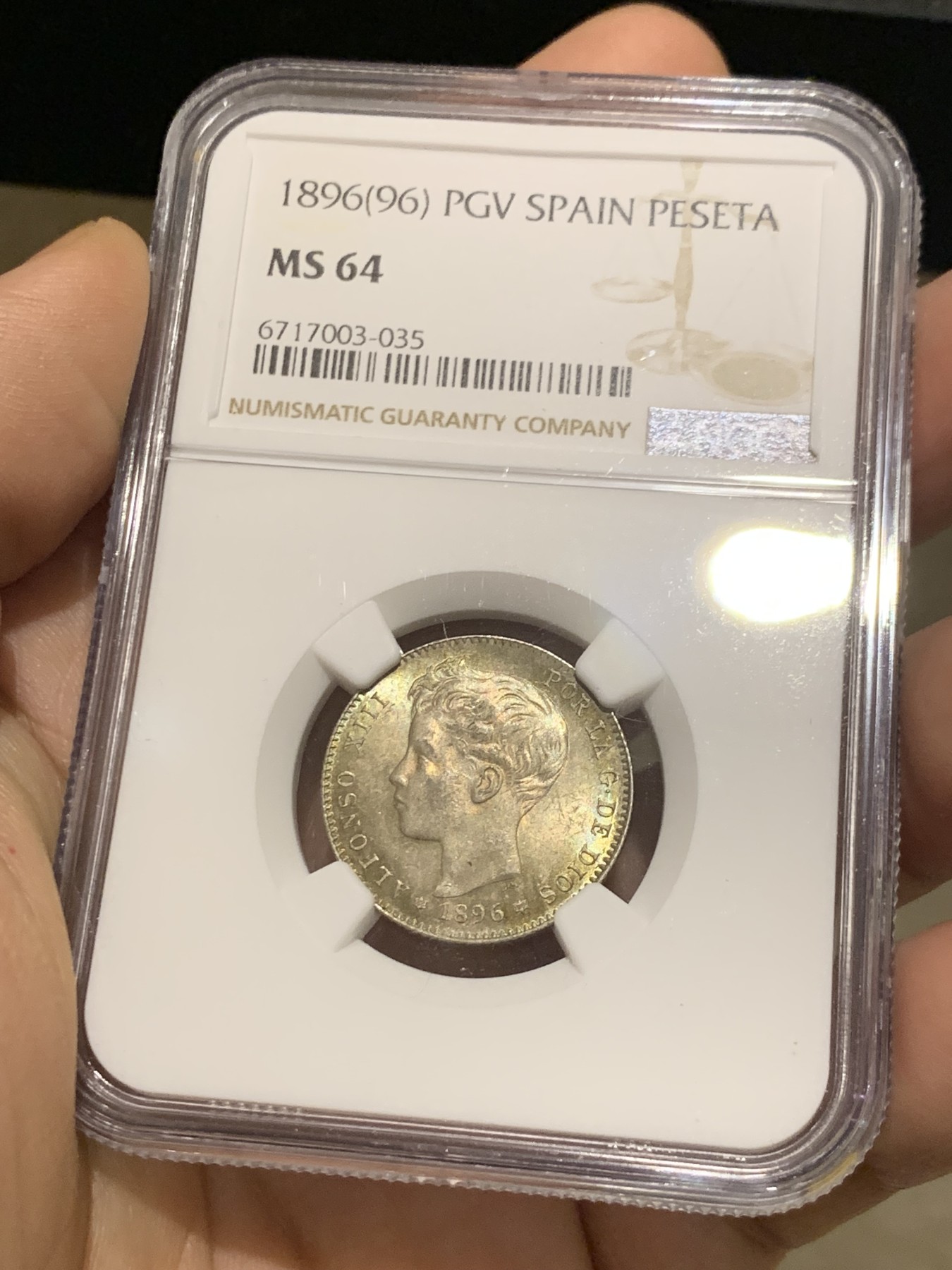 《竞宝斋》第215场-周日，周一 2场 (全场包邮) NGC MS64 西班牙1896年阿方索十三世1比塞塔银币 高分 五彩包浆 难得