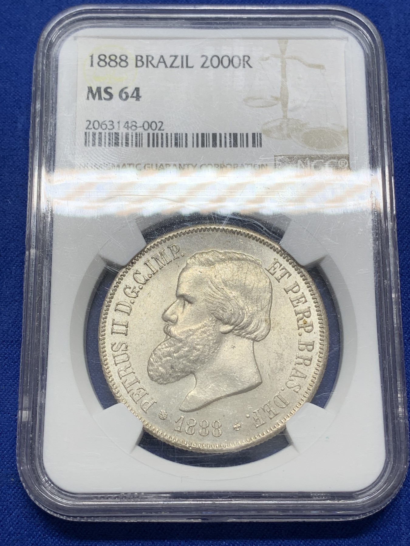 《竞宝斋》第215场-周日，周一 2场 (全场包邮) NGC-MS64 巴西 1888年2000瑞尔 佩德罗二世 大胡子银币 淡黄包浆 MS-64稀有高分一步到位 南美热点品种