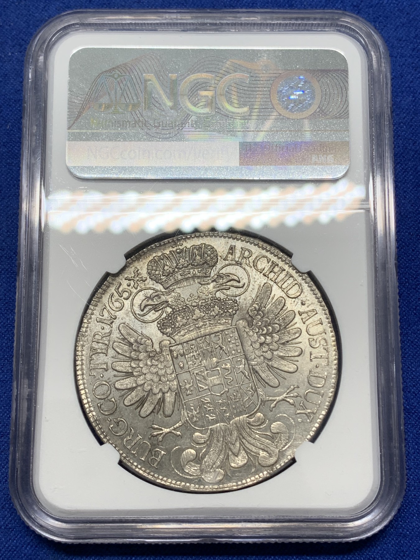 《竞宝斋》第215场-周日，周一 2场 (全场包邮) NGC-UNC 神圣罗马帝国 1765 1泰勒 玛丽亚特蕾莎大银币 维也纳造币厂 淡金彩 正面表面极浅划痕