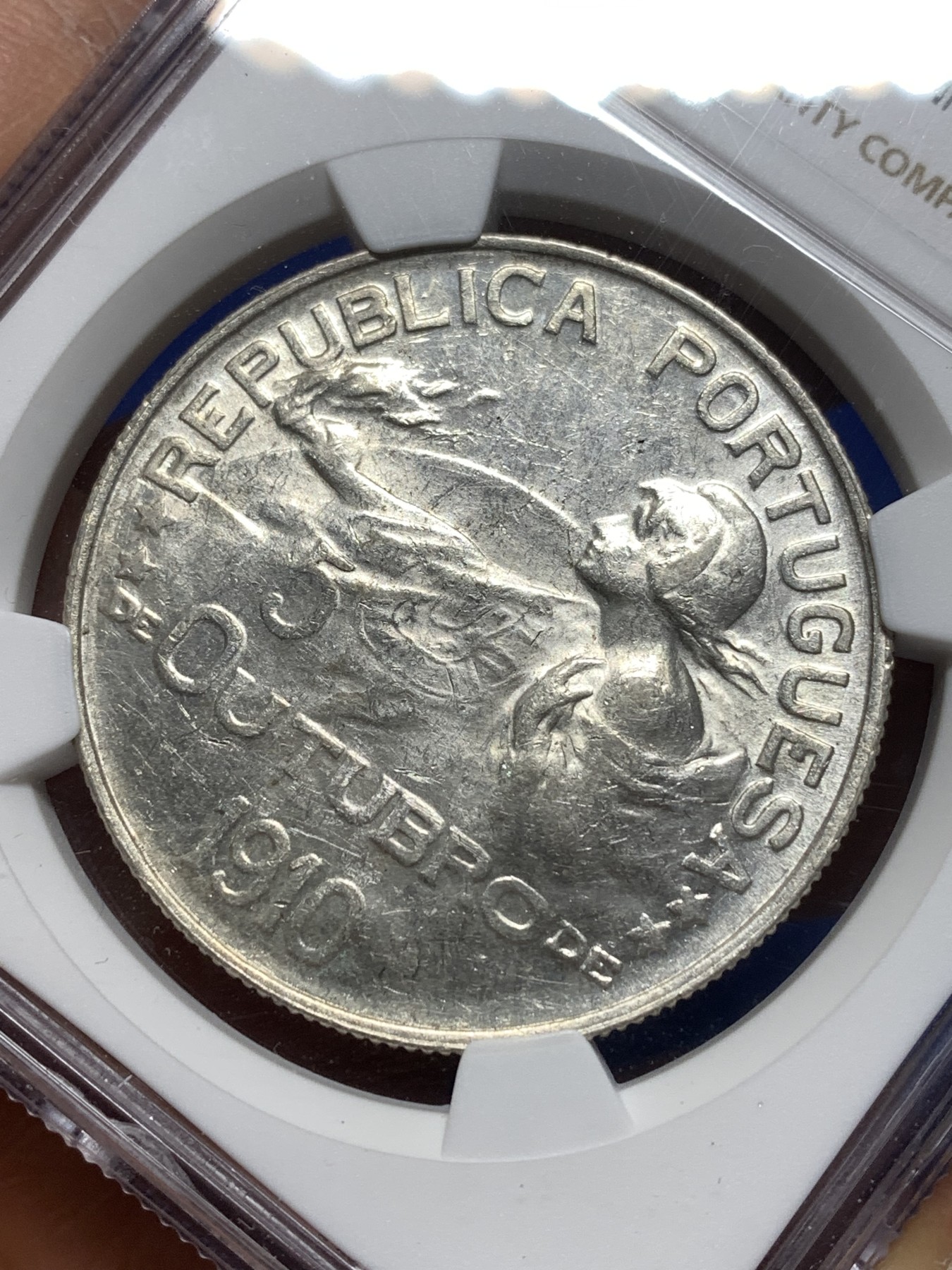 《竞宝斋》第215场-周日，周一 2场 (全场包邮) NGC-AU58 葡萄牙 1910年 半岛战争女神 1埃斯库多大银币