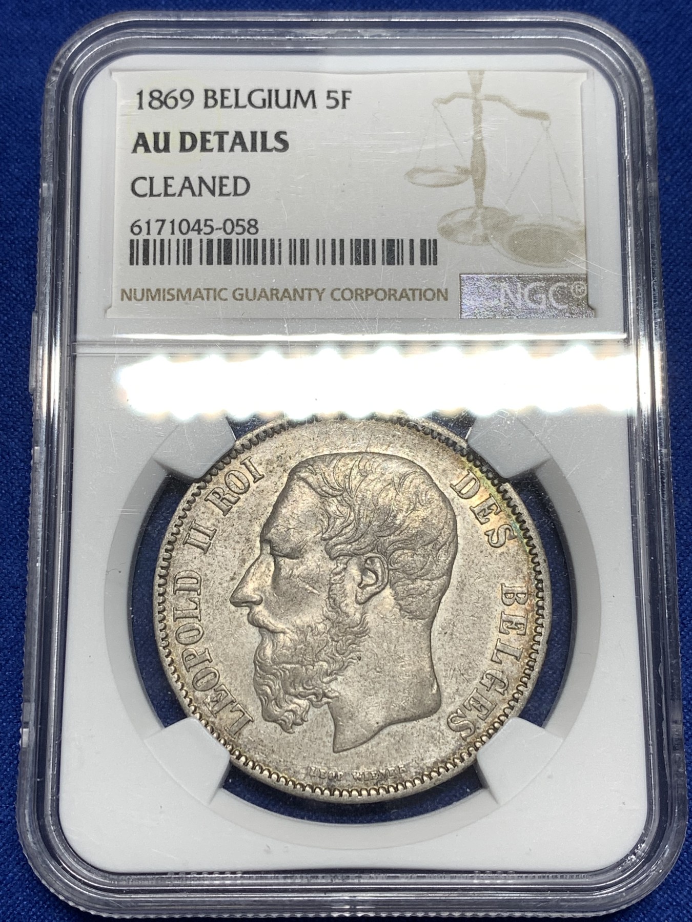 《竞宝斋》第215场-周日，周一 2场 (全场包邮) NGC AUD 比利时 1869年5法郎 利奥波德 大胡子银币 包浆极好，适合砸盒把玩