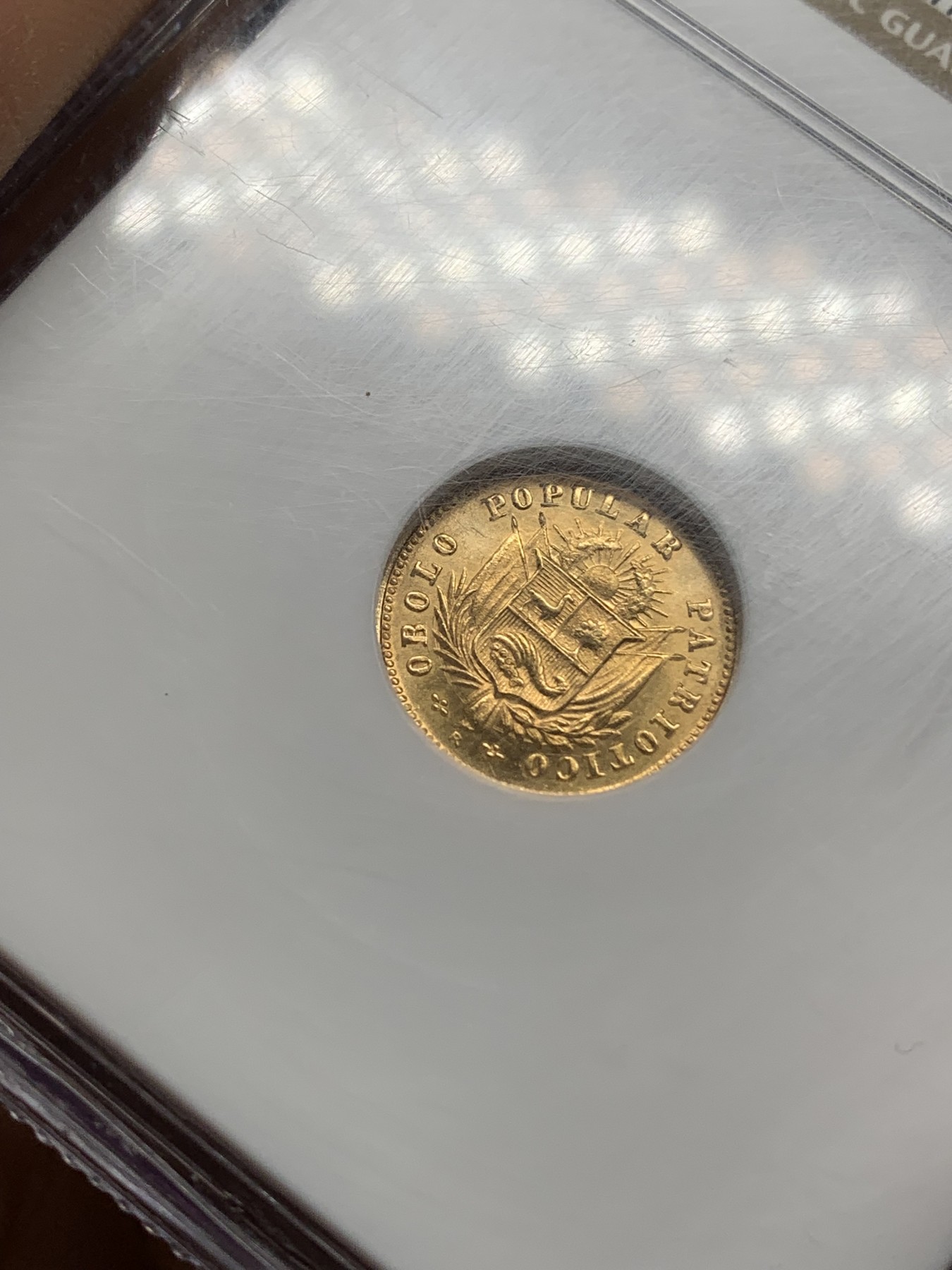 《竞宝斋》第216场-周日，周一 2场 (全场包邮) NGC-MS63 秘鲁 1910年5SOLES金币 少见品种 早期老盒严评