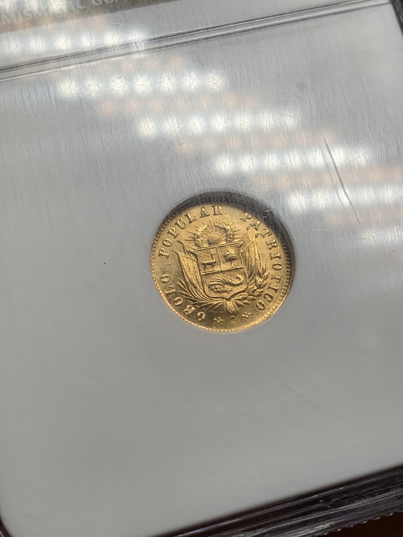 《竞宝斋》第216场-周日，周一 2场 (全场包邮) NGC-MS63 秘鲁 1910年5SOLES金币 少见品种 早期老盒严评