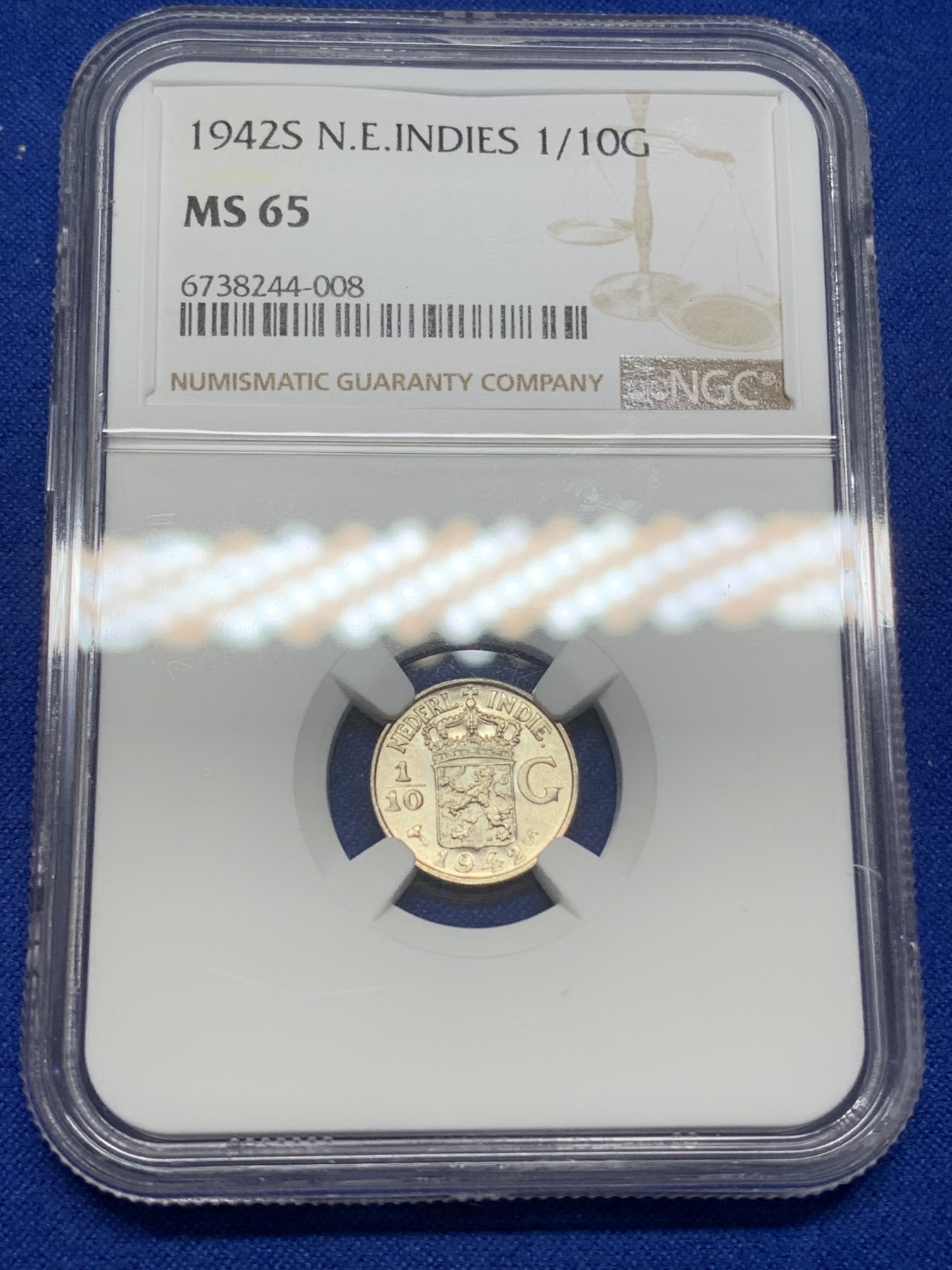 《竞宝斋》第216场-周日，周一 2场 (全场包邮) NGC-MS65 荷属东印度群岛 今印尼 1942年 1/10盾银币 高分 卷拆品