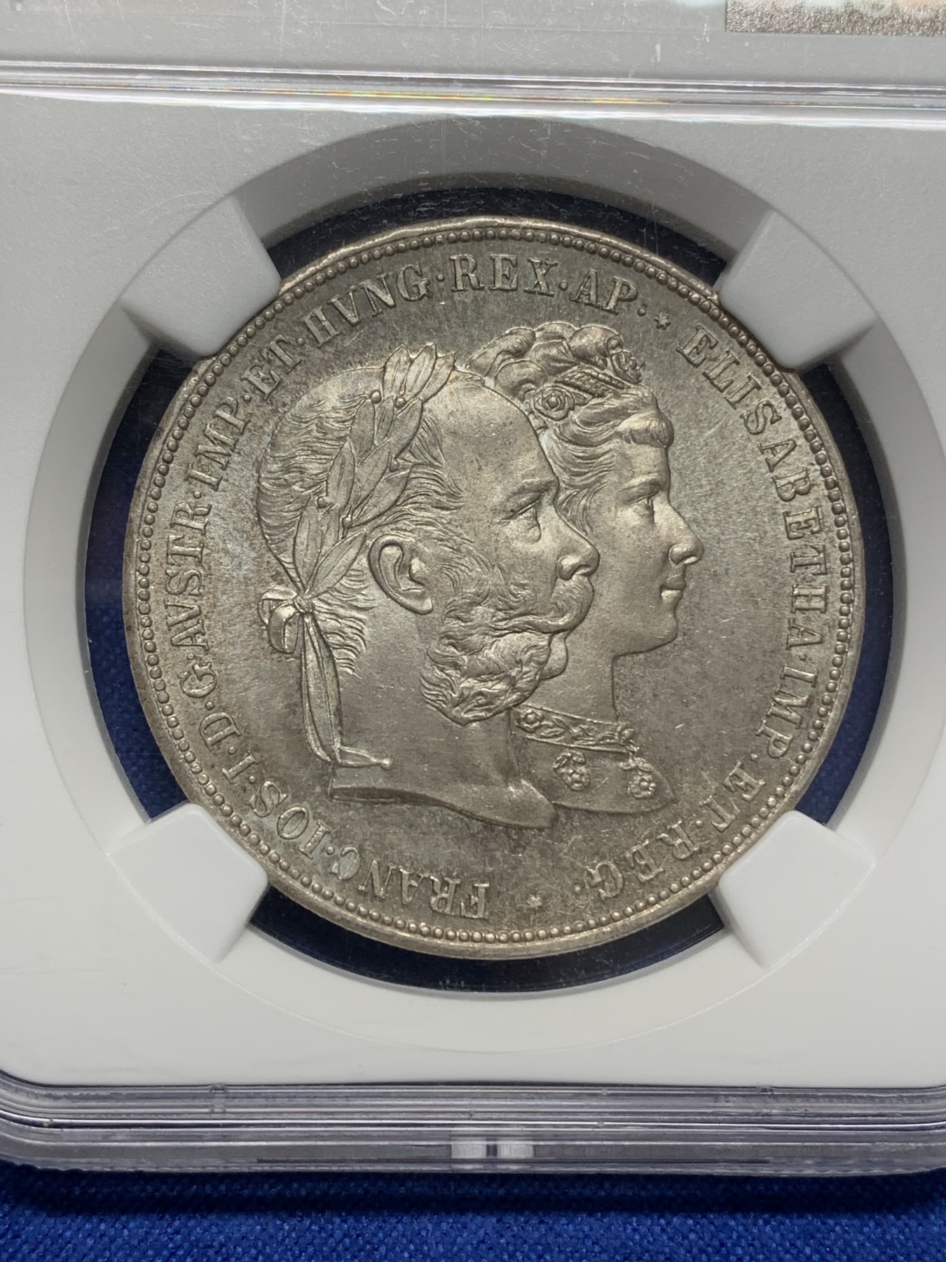 《竞宝斋》第216场-周日，周一 2场 (全场包邮) NGC-MS63 奥地利1879年茜茜公主结婚纪念 2福林=1泰勒 双面淡彩包浆 PL底板 感觉低评了