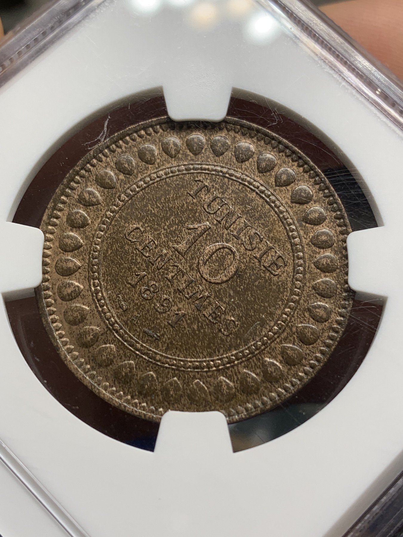 《竞宝斋》第216场-周日，周一 2场 (全场包邮) NGC-MS62BN 突尼斯AH1308/1891年10分大铜币，富有特色的伊斯兰风格大铜，流通充分，MS稀见，不是高分多见的后期版。更高分仅3枚