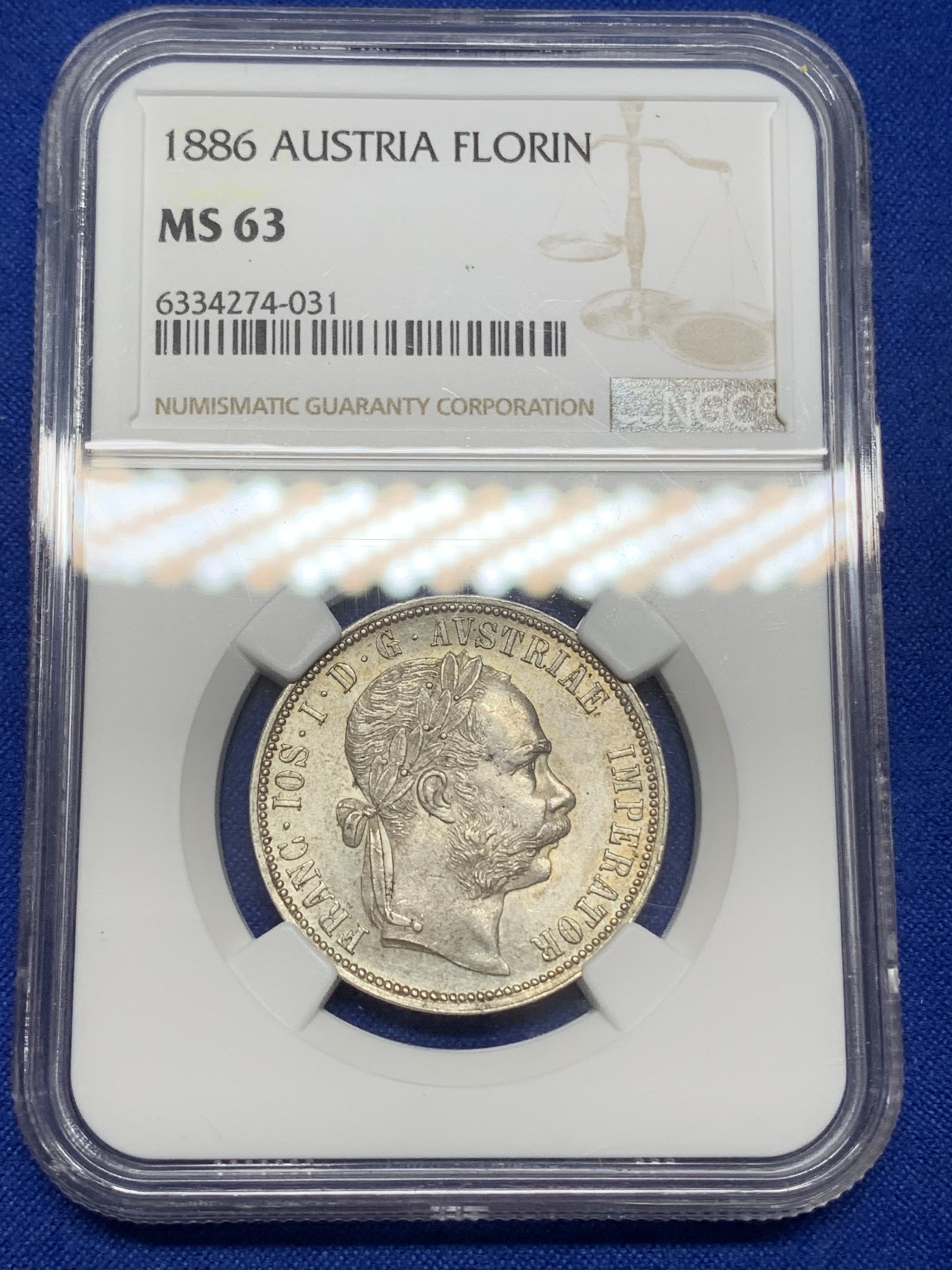 《竞宝斋》第216场-周日，周一 2场 (全场包邮) NGC-MS63 1886年奥匈帝国1弗罗林银币，弗朗兹约瑟夫皇帝像+双头鹰。底板丝滑，银光流畅。