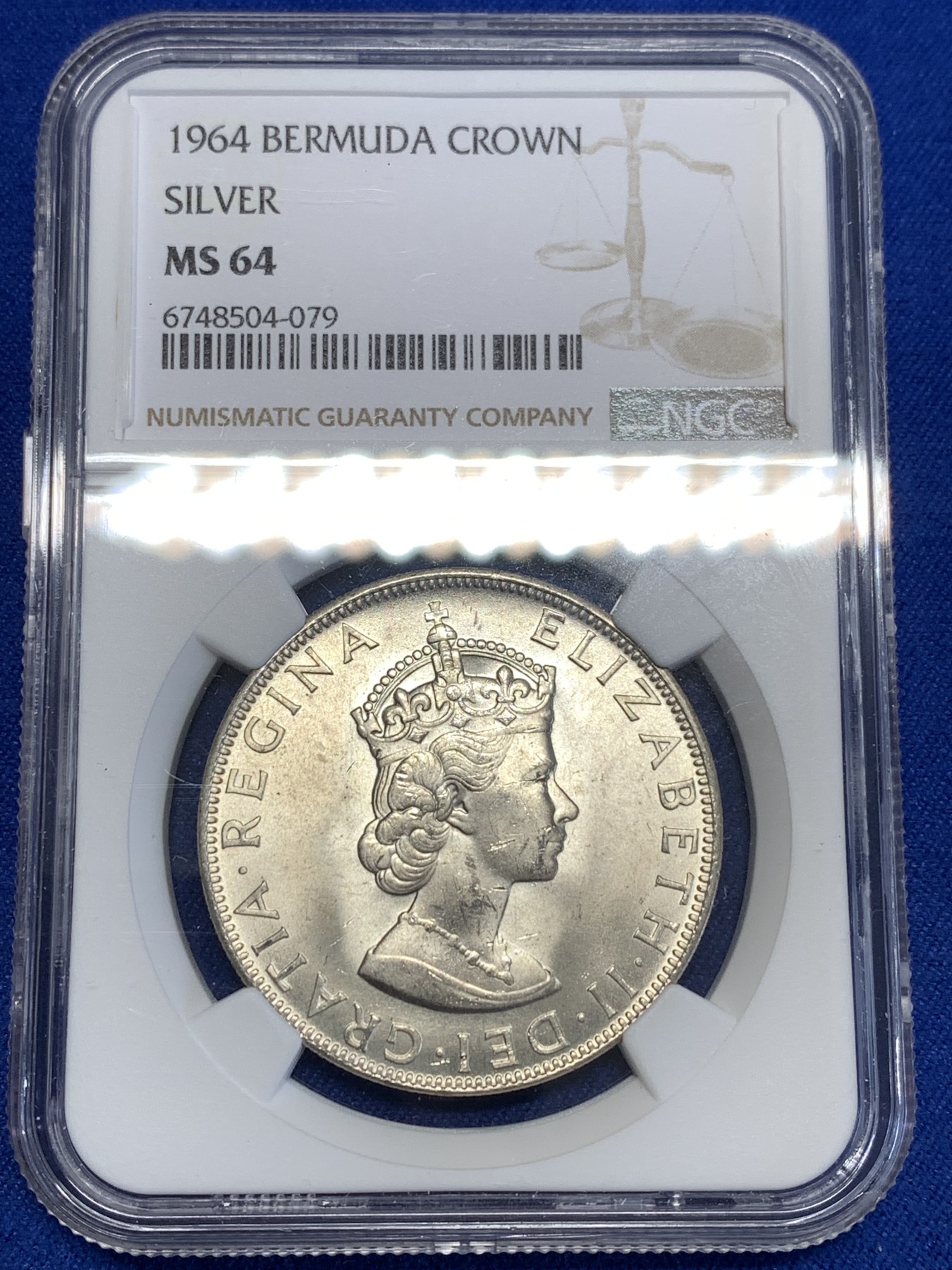 《竞宝斋》第216场-周日，周一 2场 (全场包邮) NGC-MS64 英属百慕大群岛1964年一克朗银币 经典女皇头像 十分漂亮