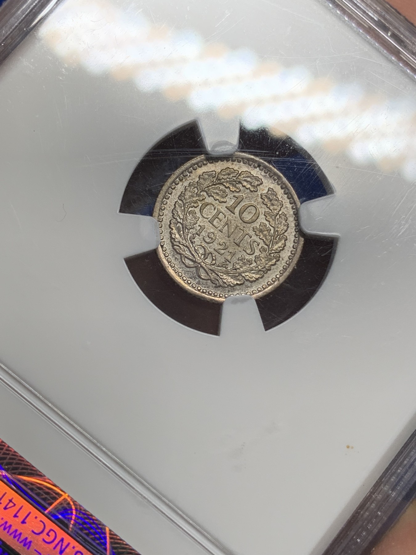 《竞宝斋》第216场-周日，周一 2场 (全场包邮) NGC-MS64 季军分 荷兰1921年威廉明娜女王10分银币，老盒高分，状态极佳。少妇版女王头像，玲珑可爱。