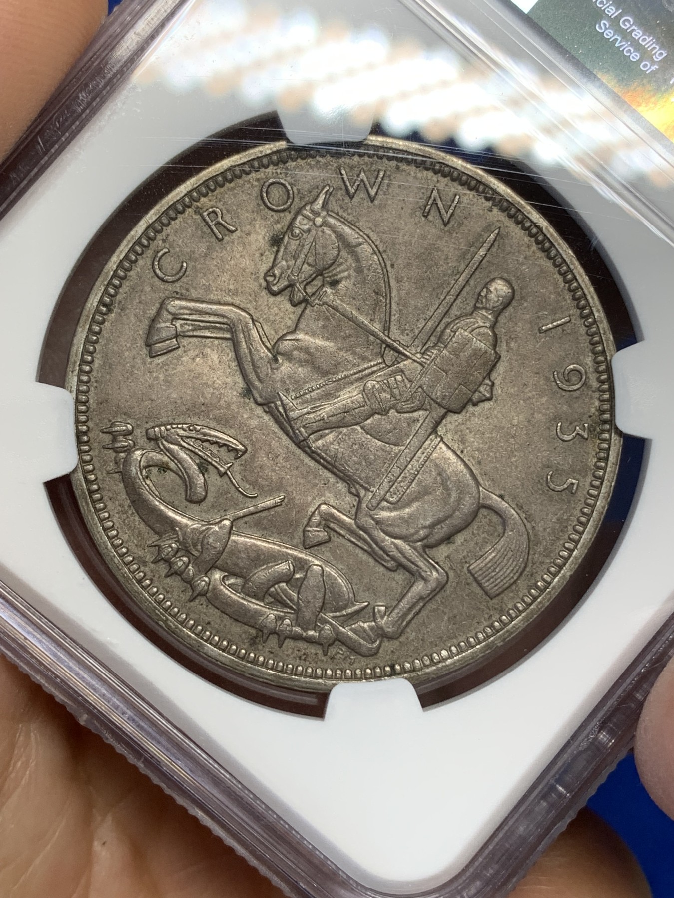 《竞宝斋》第216场-周日，周一 2场 (全场包邮) NGC- MS63 英国1935年木马剑银币，转光好品。