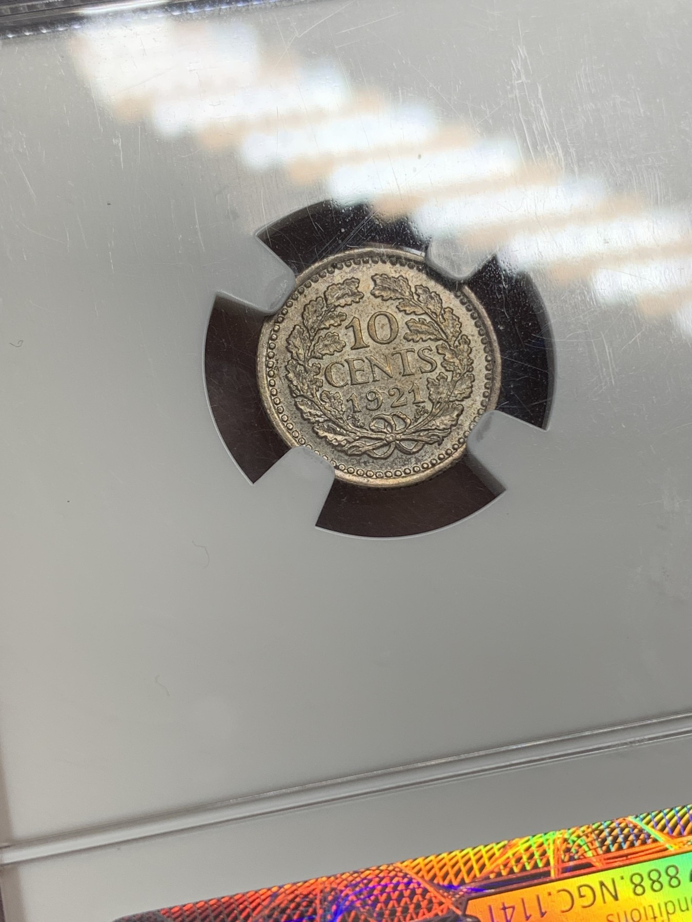 《竞宝斋》第216场-周日，周一 2场 (全场包邮) NGC-MS64 季军分 荷兰1921年威廉明娜女王10分银币，老盒高分，状态极佳。少妇版女王头像，玲珑可爱。
