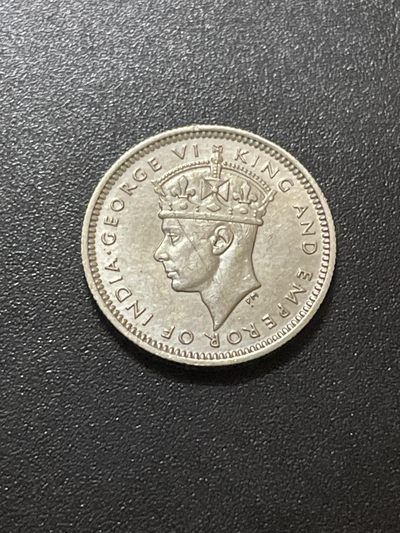 洪武诸明·稀奇钱币基地74场 - 1941年英属海峡男皇版10分银币（接近全新）