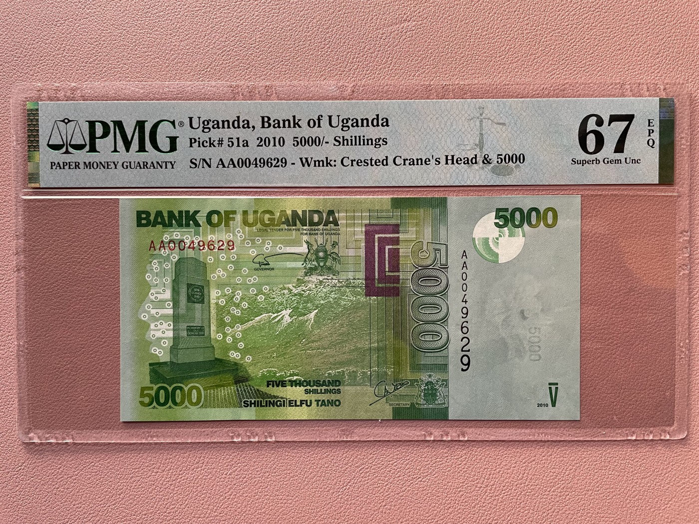 2010年乌干达5000先令 (PMG 67E：AA0049629）1枚。