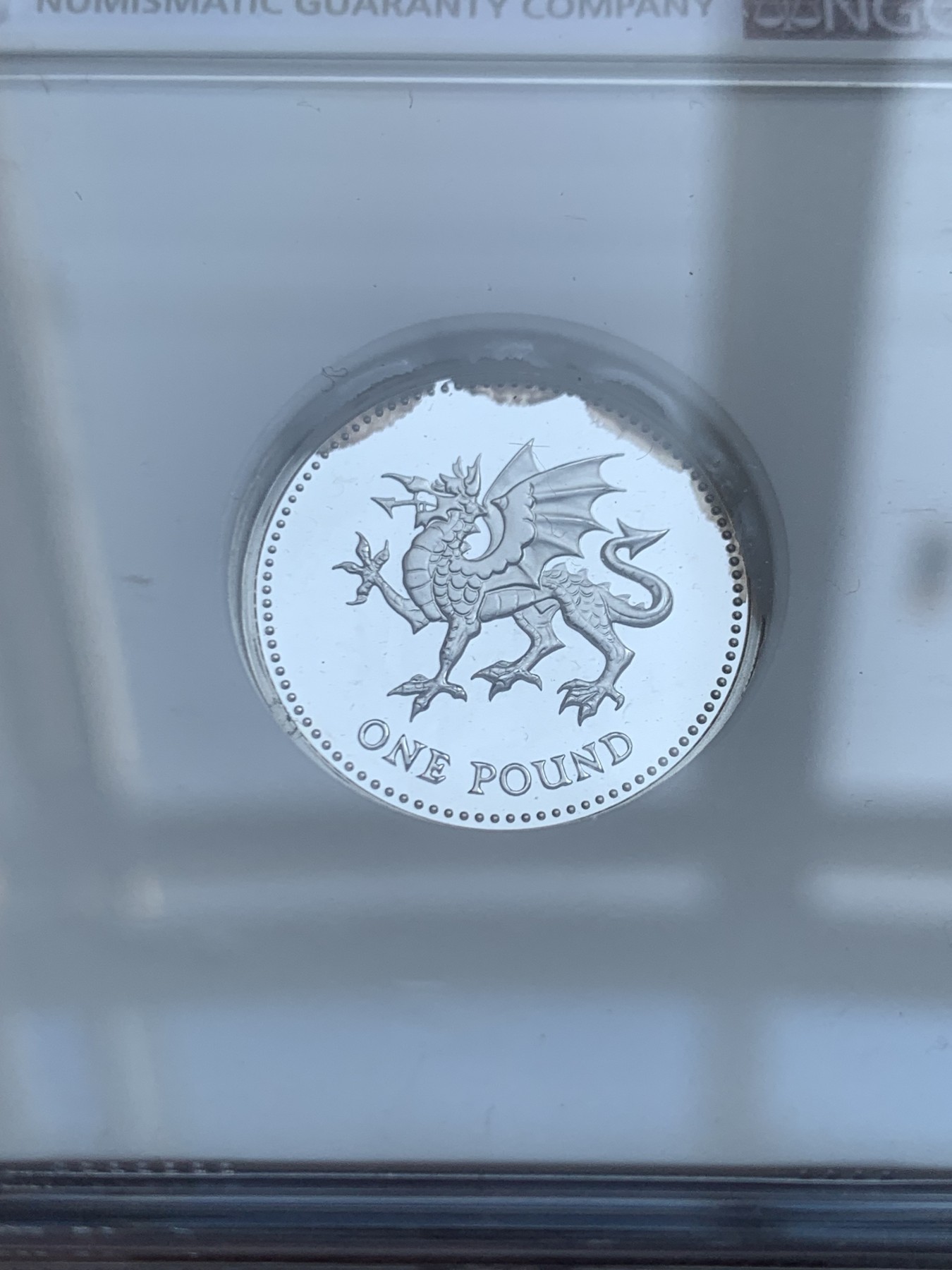 《竞宝斋》第218场-周日，周一 2场 (全场包邮) NGC-PF69UC英国2000年威尔士红龙加厚一英镑银币 造型精美 盒证齐全