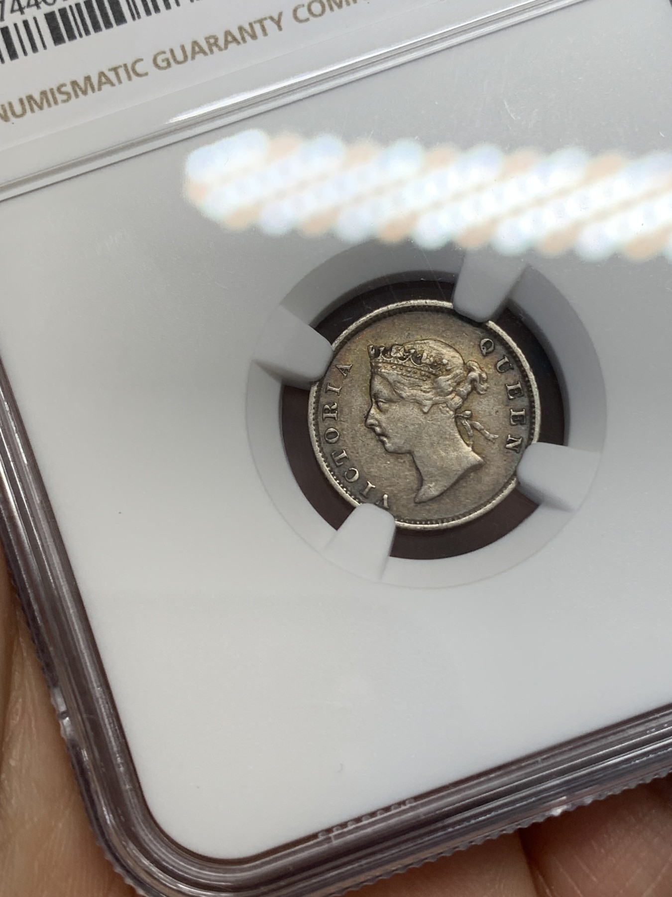 《竞宝斋》第218场-周日，周一 2场 (全场包邮) NGC XF 1891年 英属圭亚那小维4便士银币 老包浆环彩 AU的高点细节 明显低评错杀