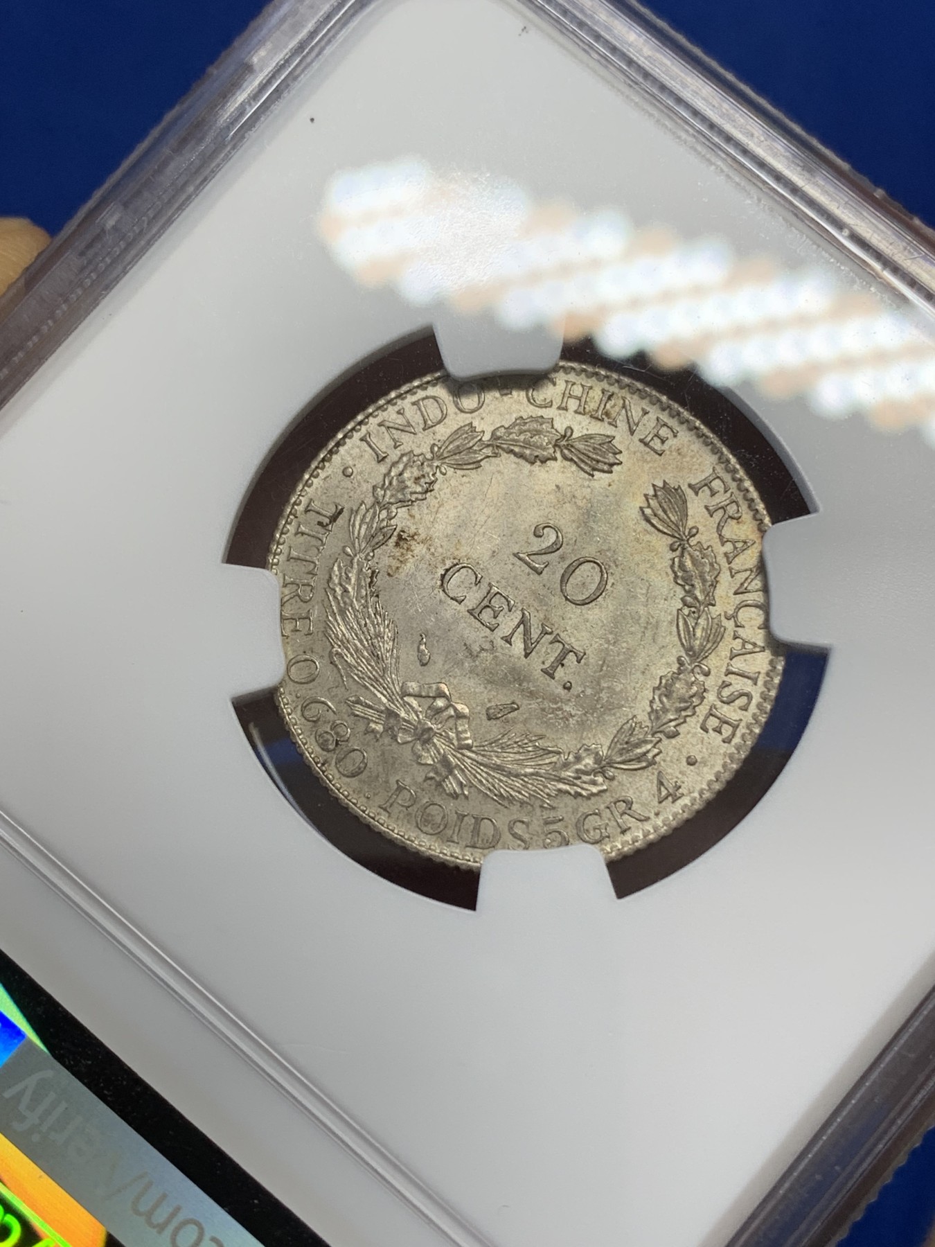 《竞宝斋》第218场-周日，周一 2场 (全场包邮) NGC MS62 1937年法属印支小坐洋20分银币 淡金彩包浆 小巧精致