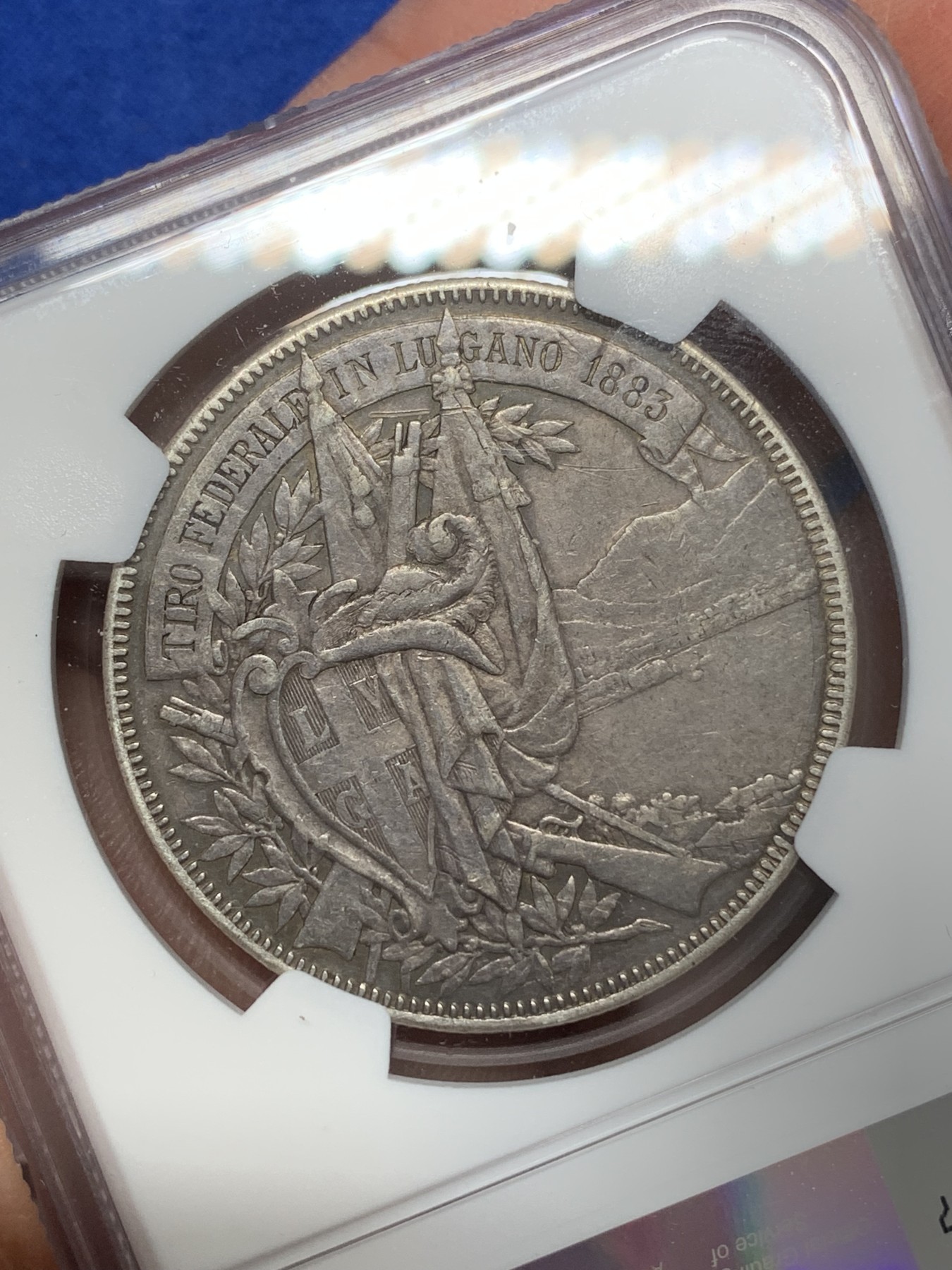 《竞宝斋》第218场-周日，周一 2场 (全场包邮) NGC XF40 瑞士 1883 卢加诺射击节 狩猎5法郎银币 原味包浆