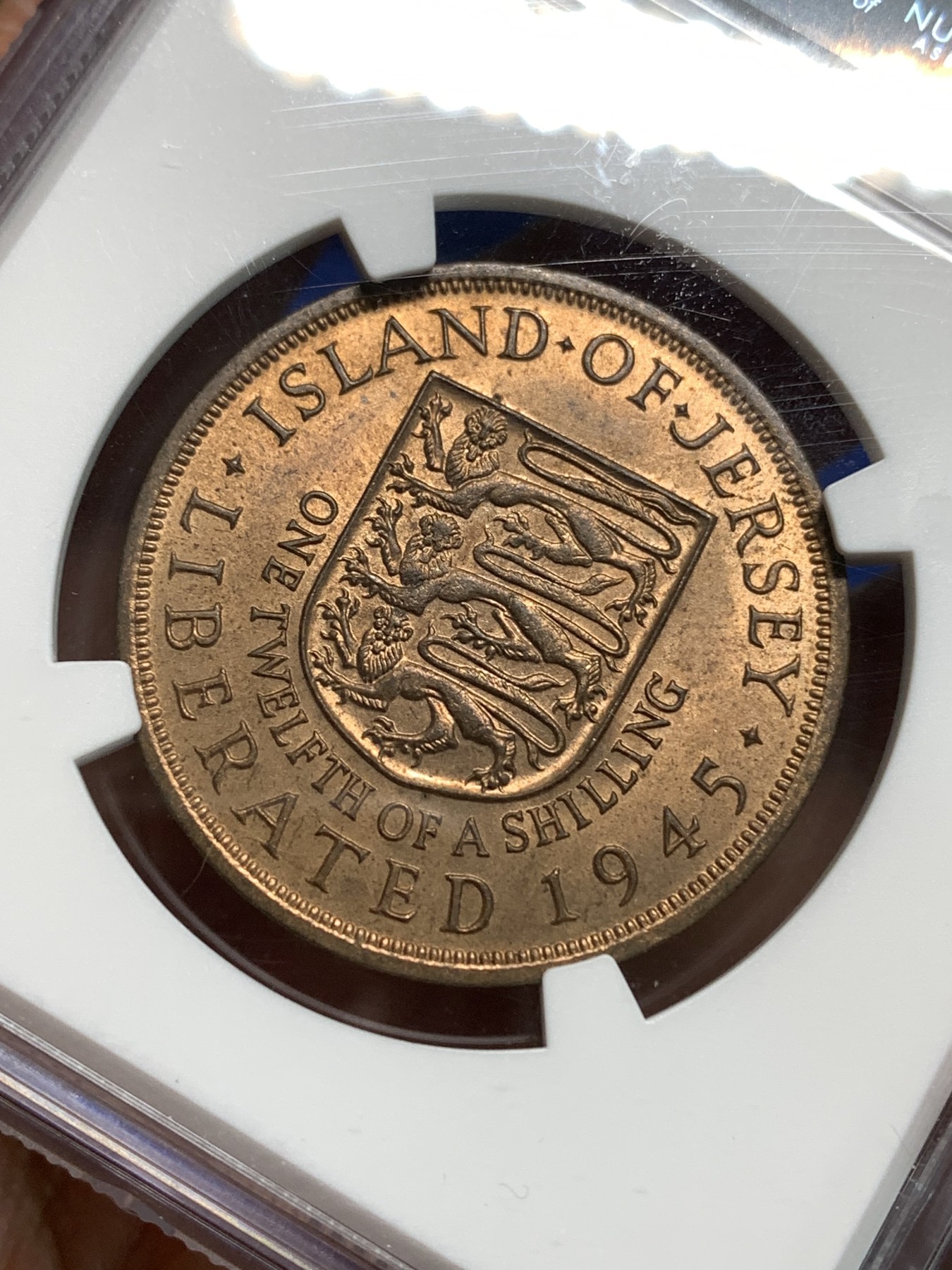 《竞宝斋》第218场-周日，周一 2场 (全场包邮) NGC-MS64RB 泽西岛1945年1/12先令铜币，伊丽莎白二世女王错版币