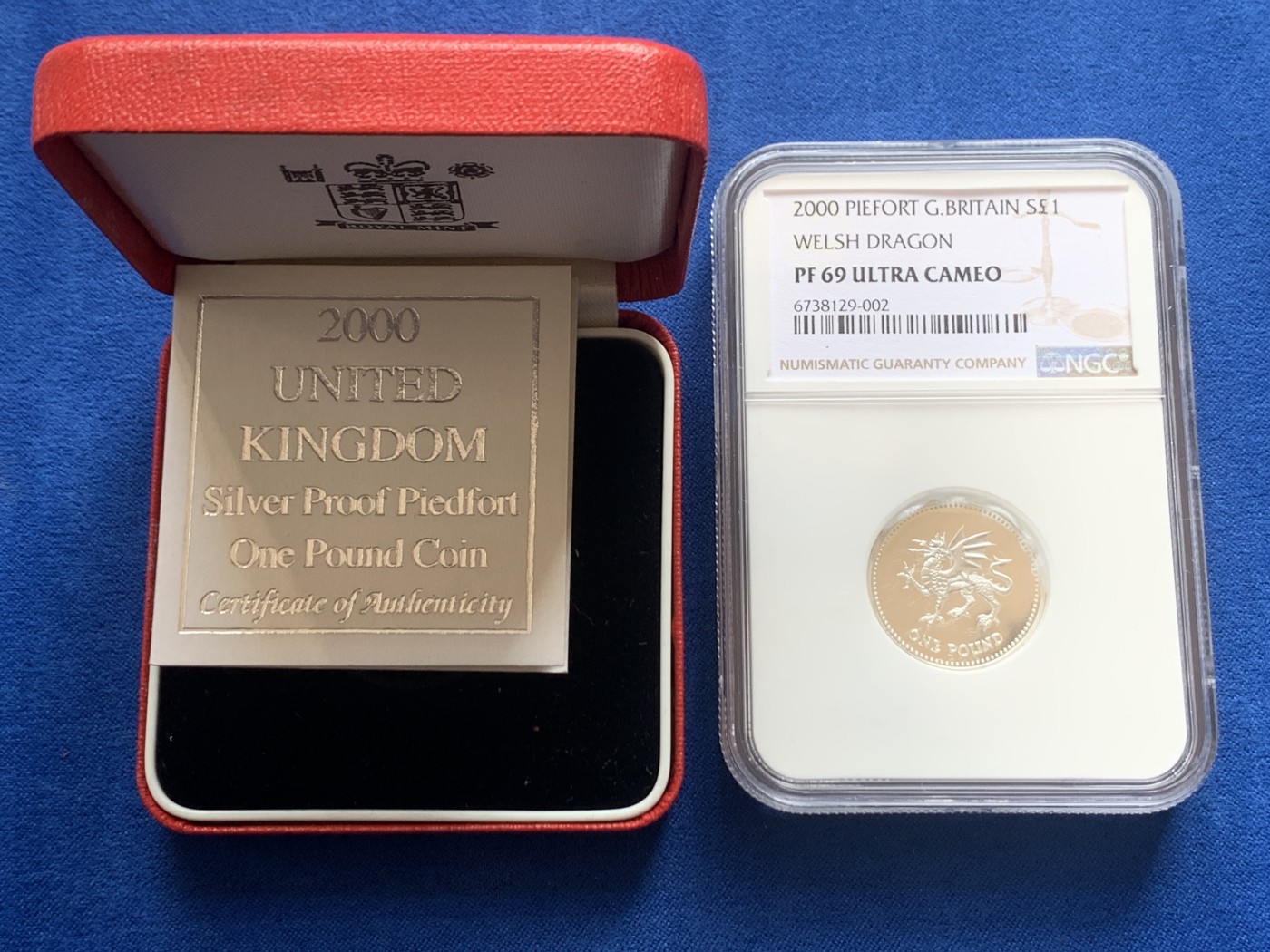 《竞宝斋》第218场-周日，周一 2场 (全场包邮) NGC-PF69UC英国2000年威尔士红龙加厚一英镑银币 造型精美 盒证齐全