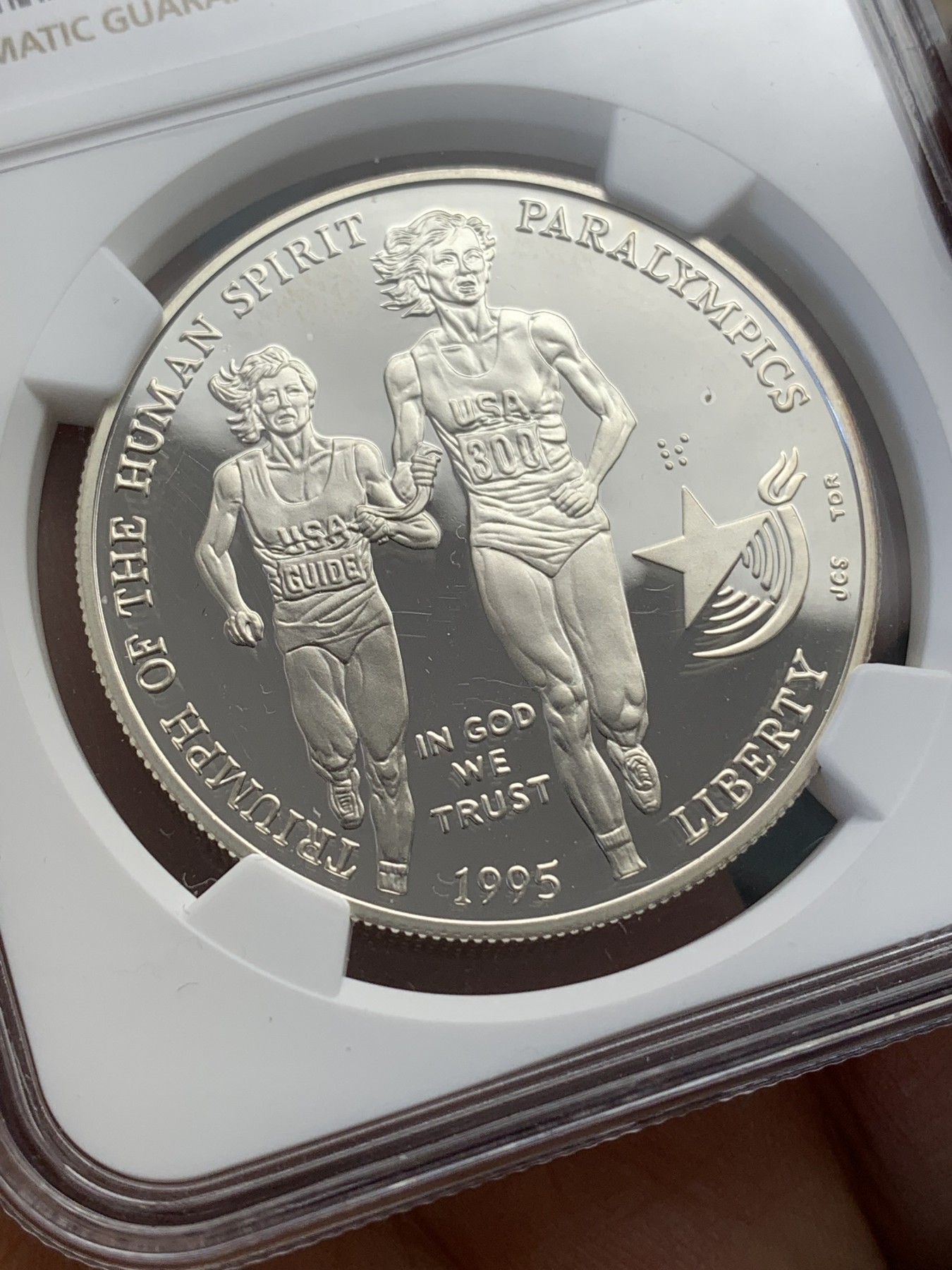 《竞宝斋》第218场-周日，周一 2场 (全场包邮) NGC PF69UC 美国1995年残奥会1美元大银币