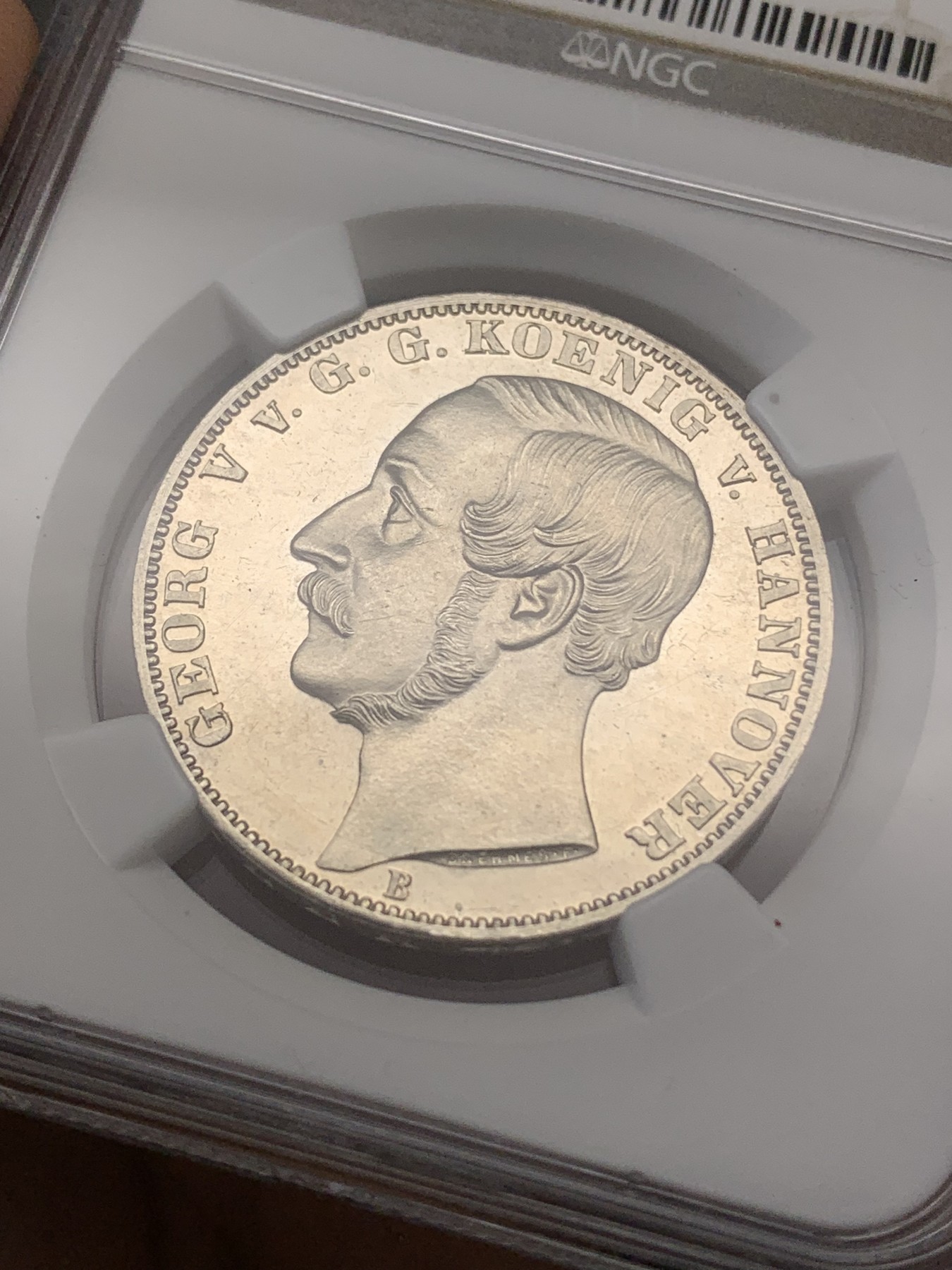 《竞宝斋》第218场-周日，周一 2场 (全场包邮) NGC MS62 1865年德国汉诺威橡树泰勒，热门经典品种，发行量2000，NGC老盒，镜面品质，高点俱在，藏家出品，低评了
