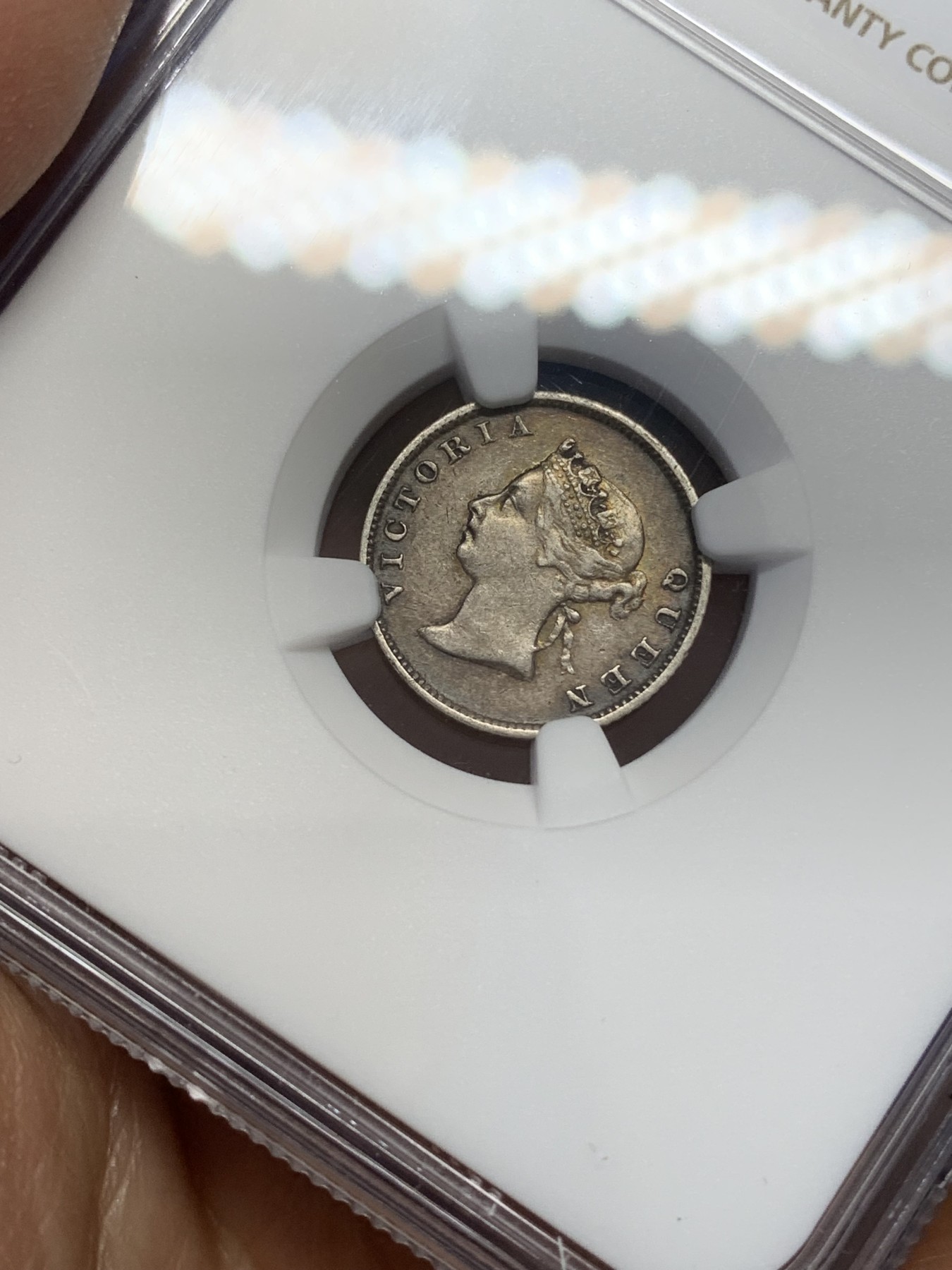 《竞宝斋》第218场-周日，周一 2场 (全场包邮) NGC XF 1891年 英属圭亚那小维4便士银币 老包浆环彩 AU的高点细节 明显低评错杀