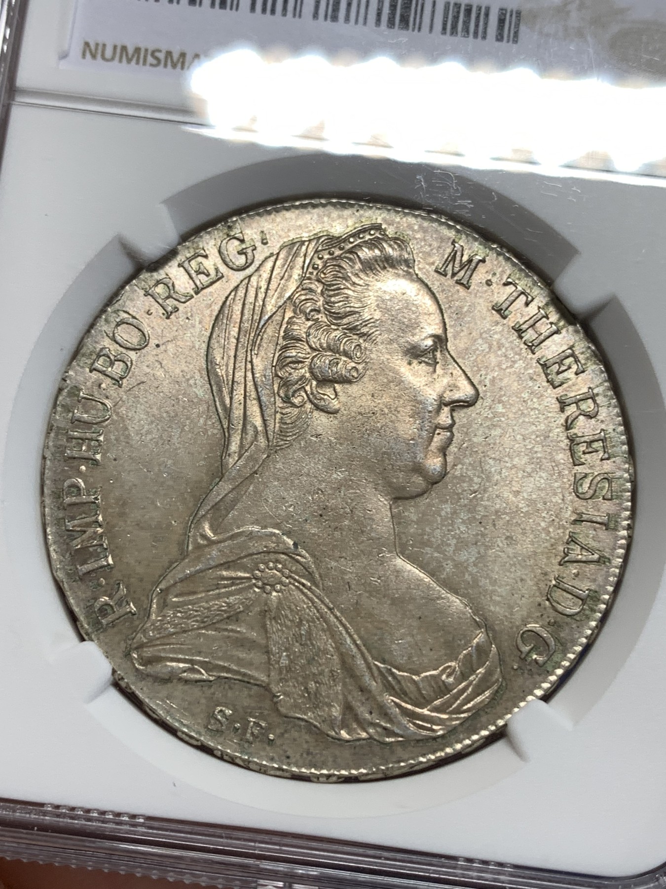 《竞宝斋》第218场-周日，周一 2场 (全场包邮) NGC-MS64 1780年奥地利大奶妈1泰勒银币，后铸，淡黄色包浆十分精美。