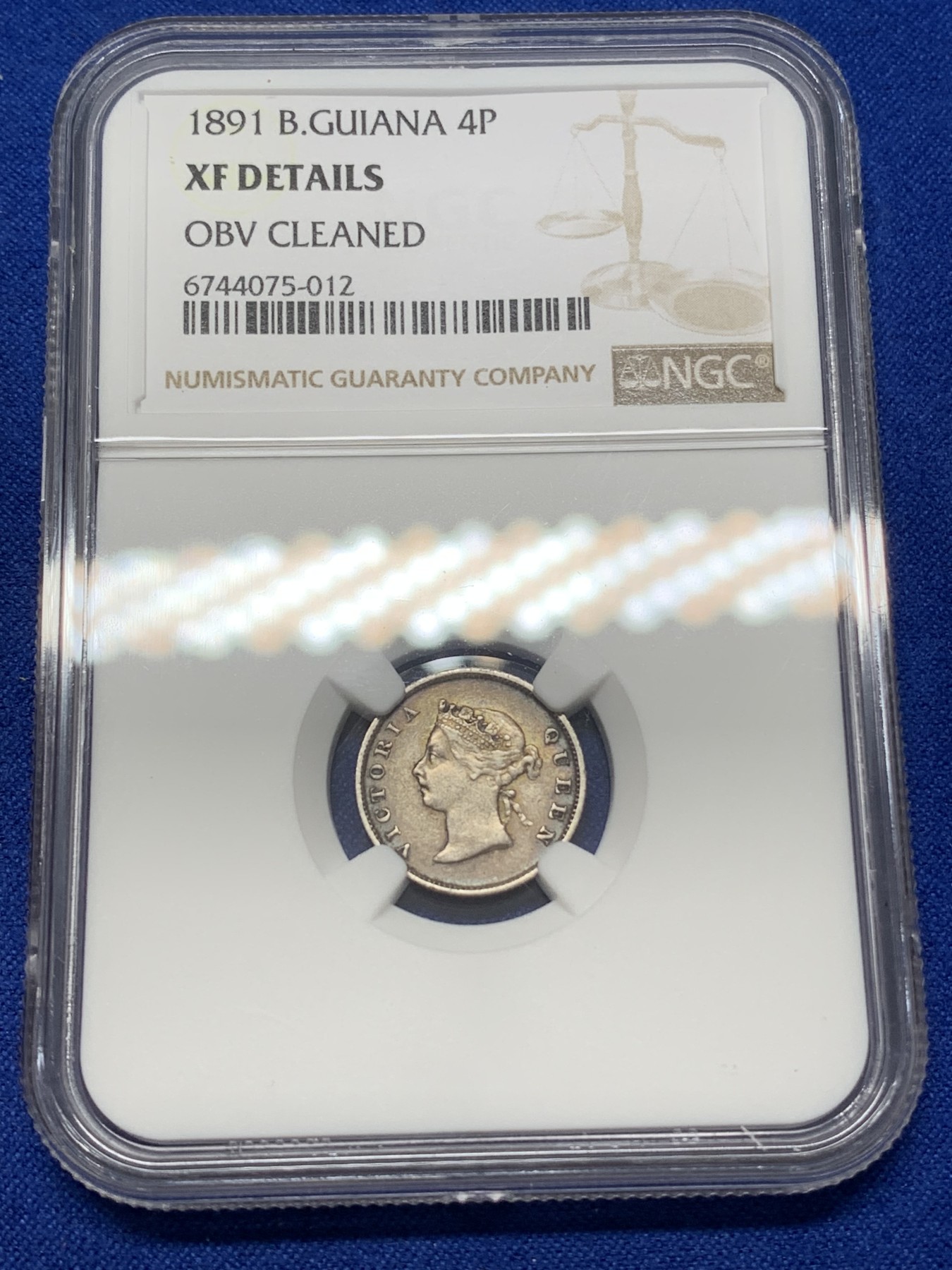 《竞宝斋》第218场-周日，周一 2场 (全场包邮) NGC XF 1891年 英属圭亚那小维4便士银币 老包浆环彩 AU的高点细节 明显低评错杀