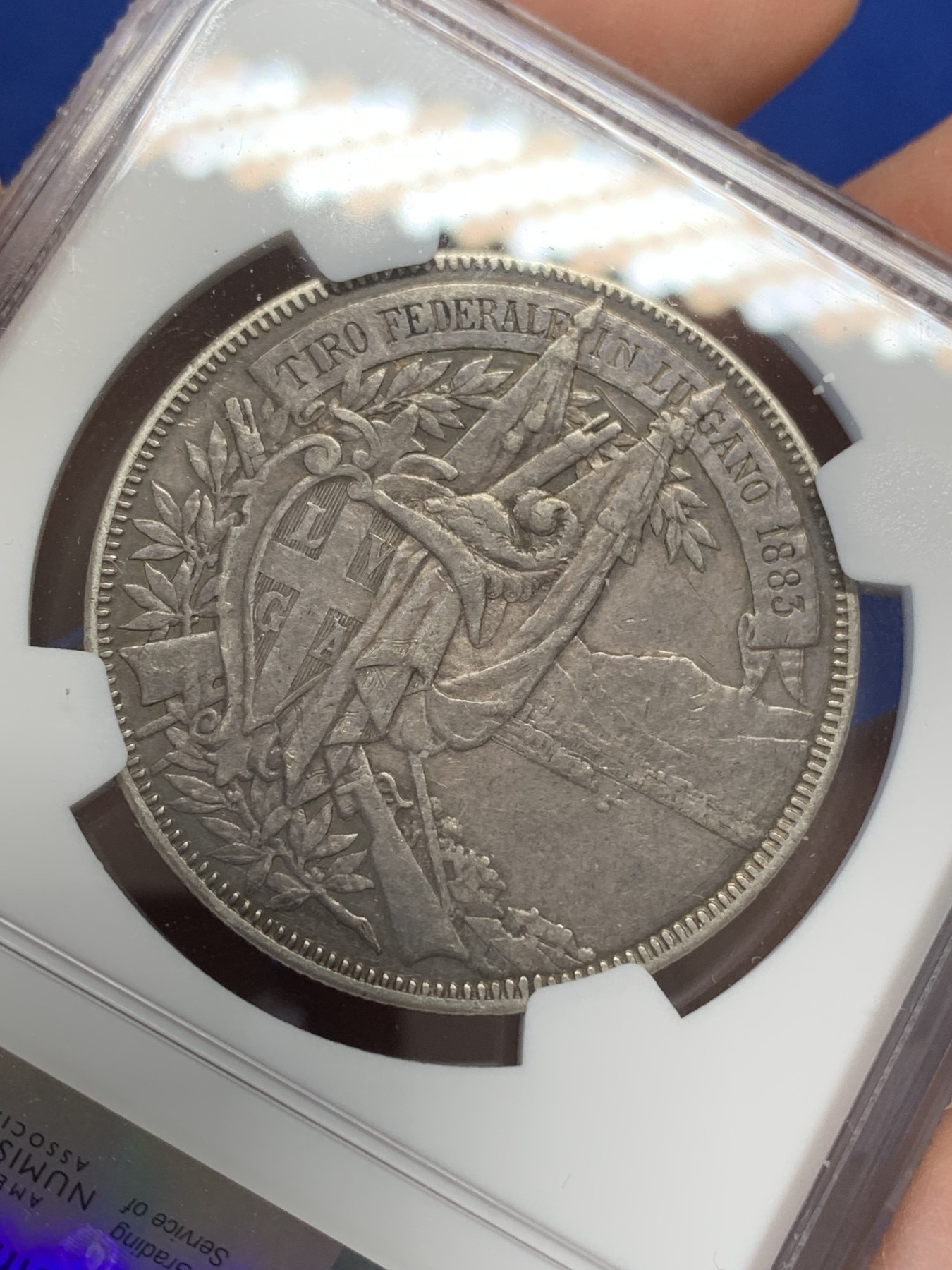 《竞宝斋》第218场-周日，周一 2场 (全场包邮) NGC XF40 瑞士 1883 卢加诺射击节 狩猎5法郎银币 原味包浆