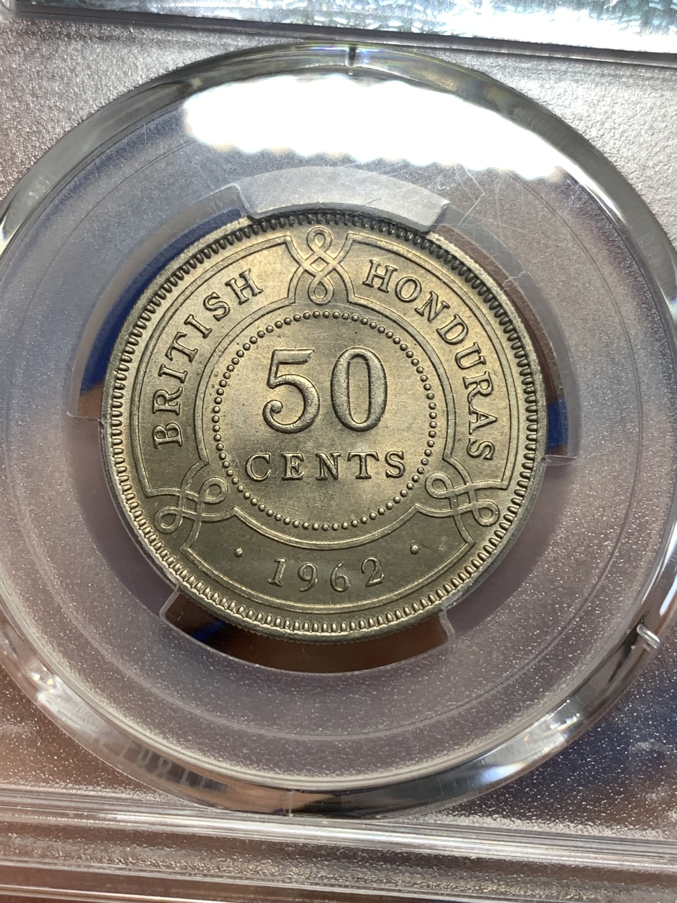 《竞宝斋》第218场-周日，周一 2场 (全场包邮) PCGS金盾 MS64 英属洪都拉斯1962年50分镍币