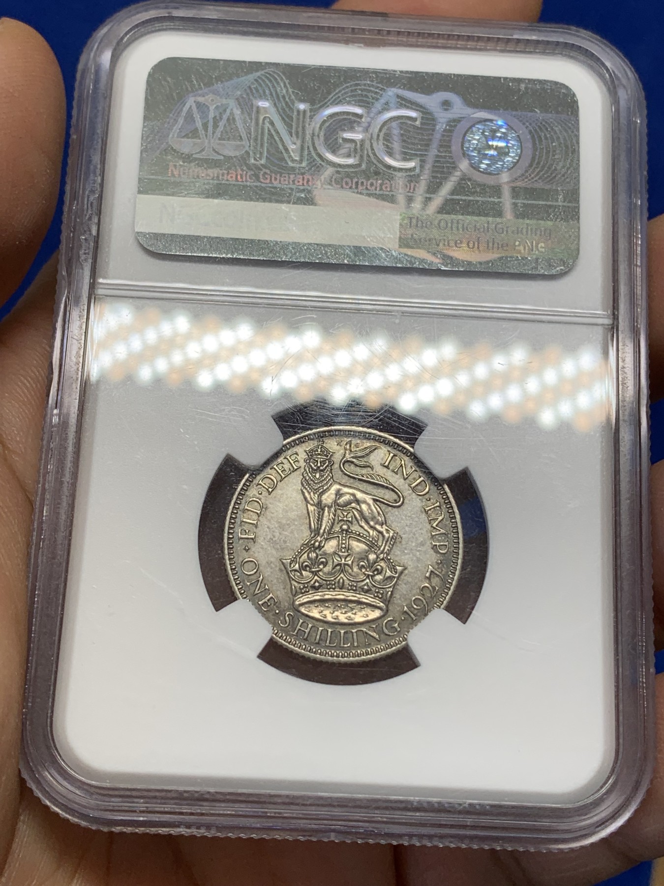 《竞宝斋》第218场-周日，周一 2场 (全场包邮) NGC-PF62 英国 1927年 乔治五世 精制 站狮 1先令银币 深色环彩