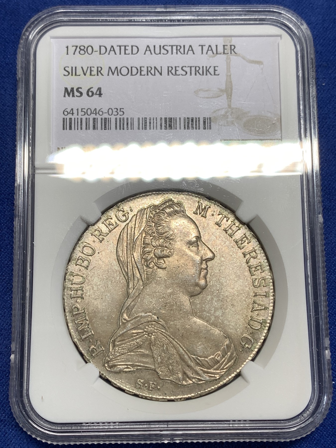 《竞宝斋》第218场-周日，周一 2场 (全场包邮) NGC-MS64 1780年奥地利大奶妈1泰勒银币，后铸，淡黄色包浆十分精美。