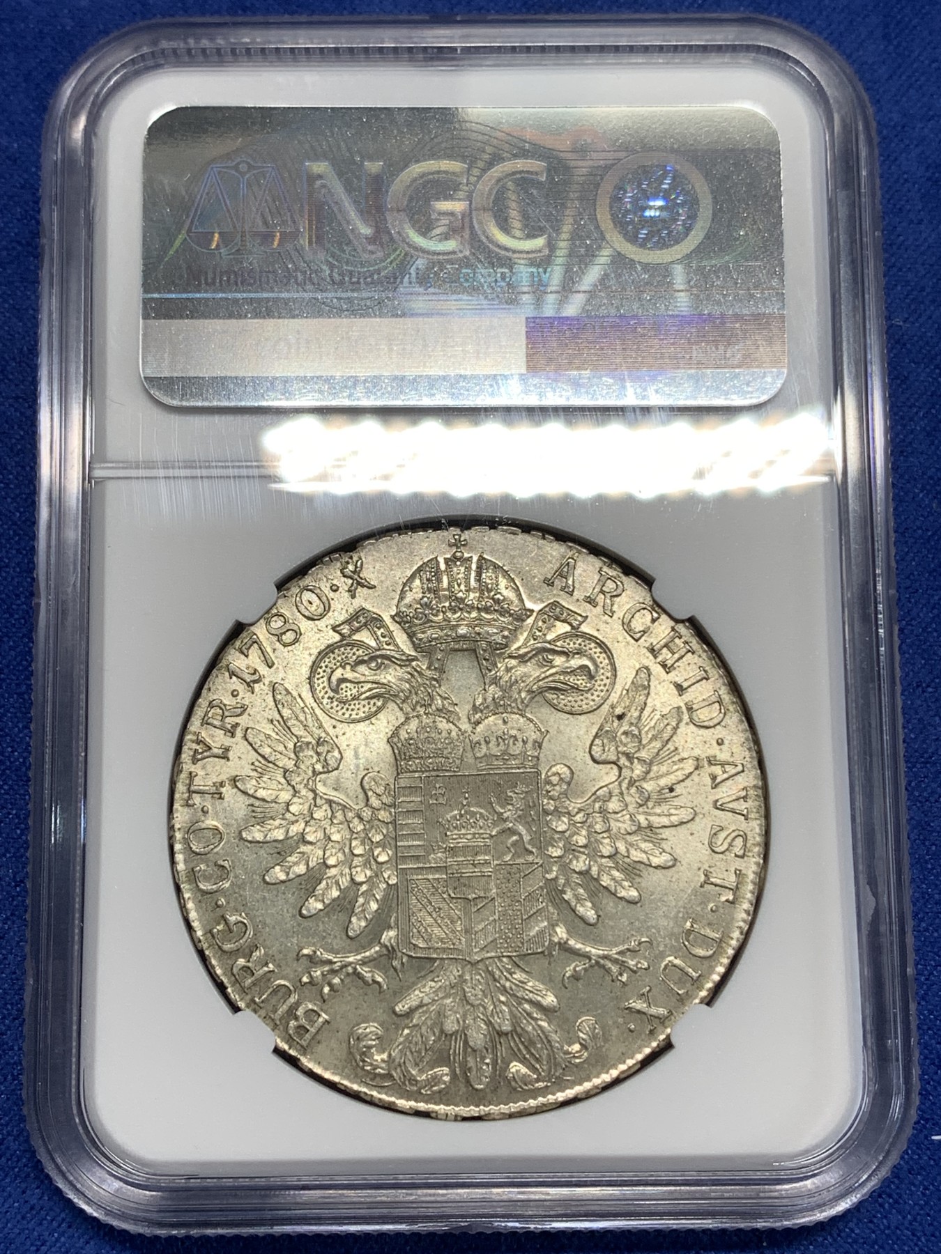 《竞宝斋》第218场-周日，周一 2场 (全场包邮) NGC-MS64 1780年奥地利大奶妈1泰勒银币，后铸，淡黄色包浆十分精美。