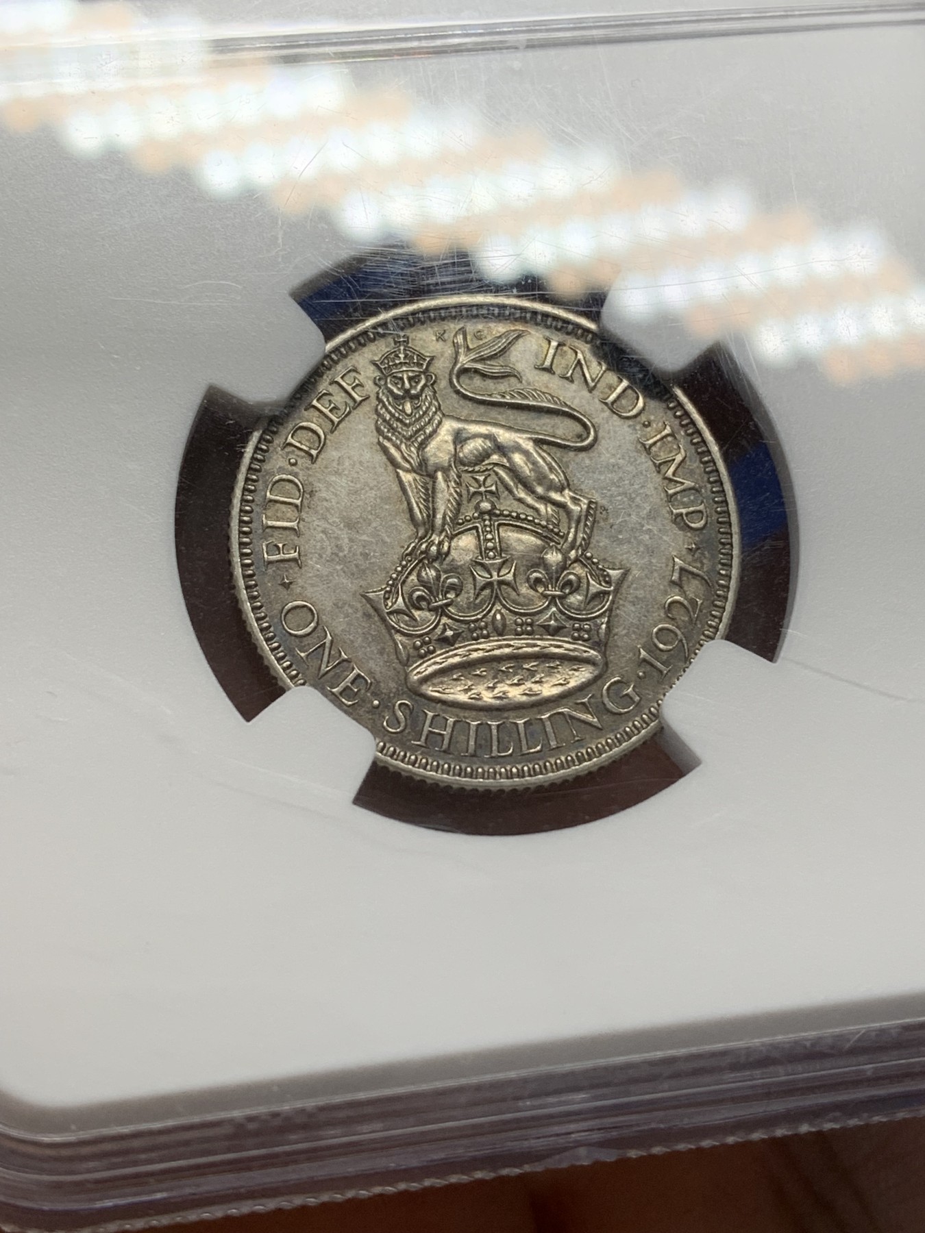 《竞宝斋》第218场-周日，周一 2场 (全场包邮) NGC-PF62 英国 1927年 乔治五世 精制 站狮 1先令银币 深色环彩