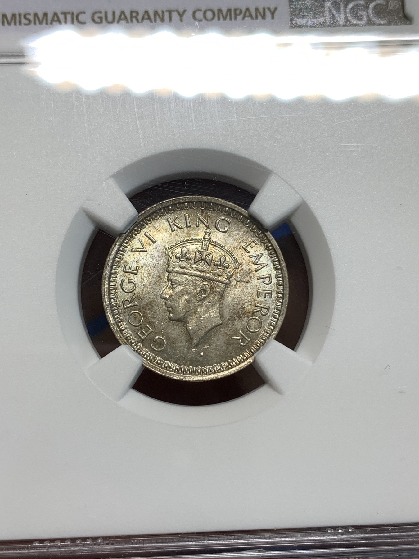 《竞宝斋》第219场-周日，周一 2场 (全场包邮) NGC-MS63 英属印度 乔治六世1/4卢比银币 孟买厂出品小五版本 双面淡五彩包浆
