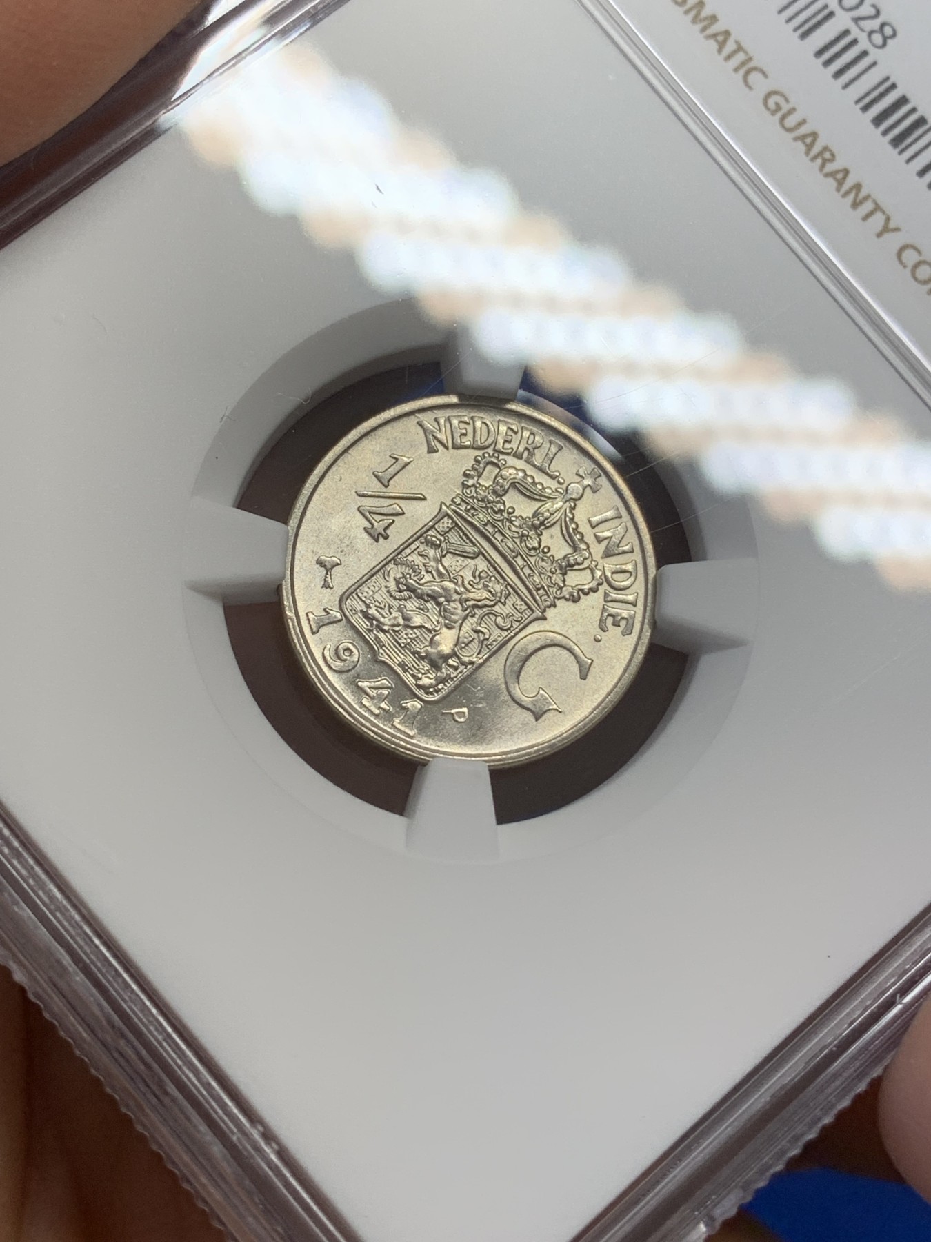 《竞宝斋》第219场-周日，周一 2场 (全场包邮) NGC-MS65 荷属东印度群岛 今印尼 1941年P版 1/4盾银币 卷拆品
