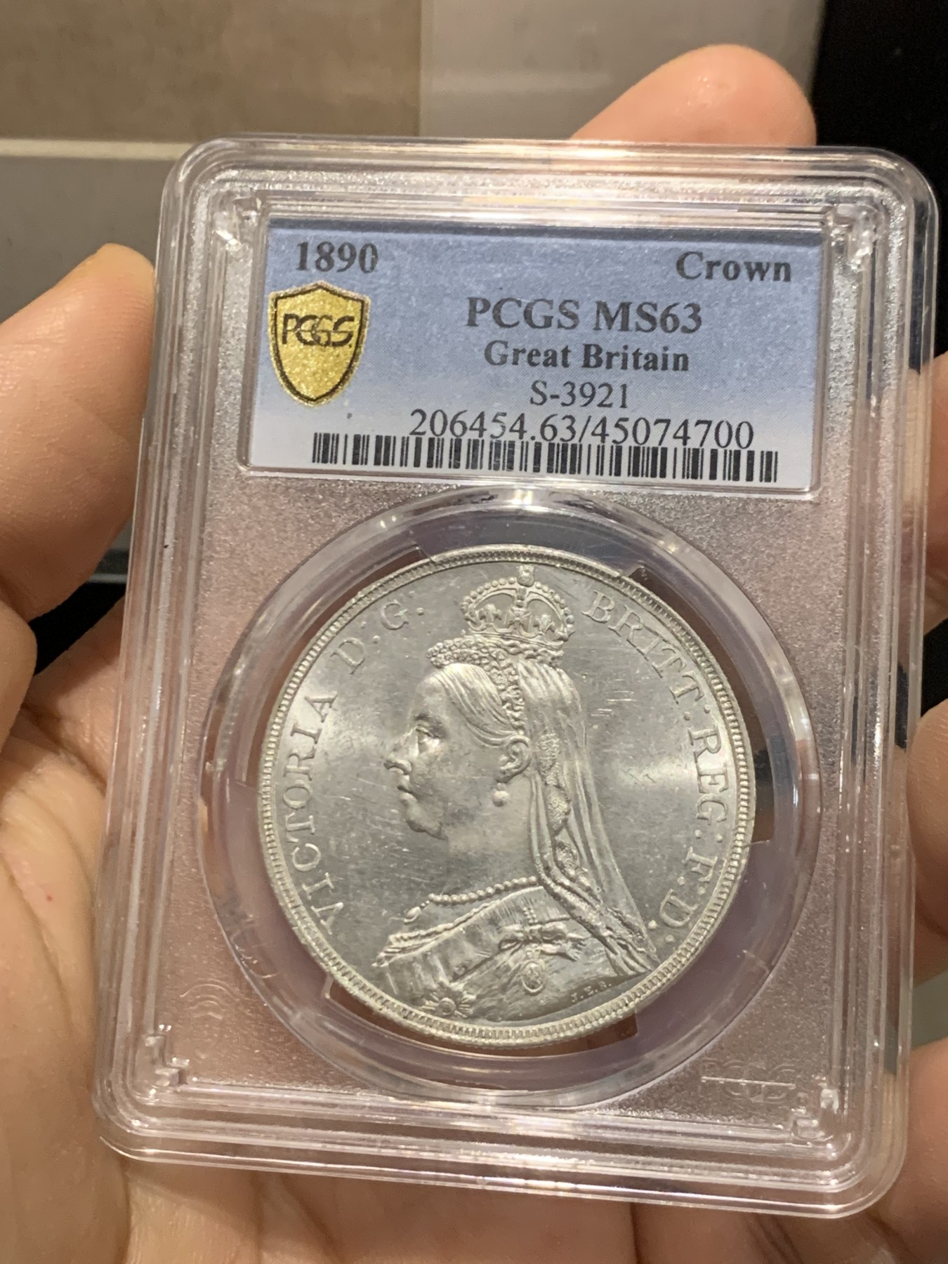 《竞宝斋》第219场-周日，周一 2场 (全场包邮) PCGS-MS63 英国1890年维多利亚高冠马剑 原品车轮光 1890少见年份