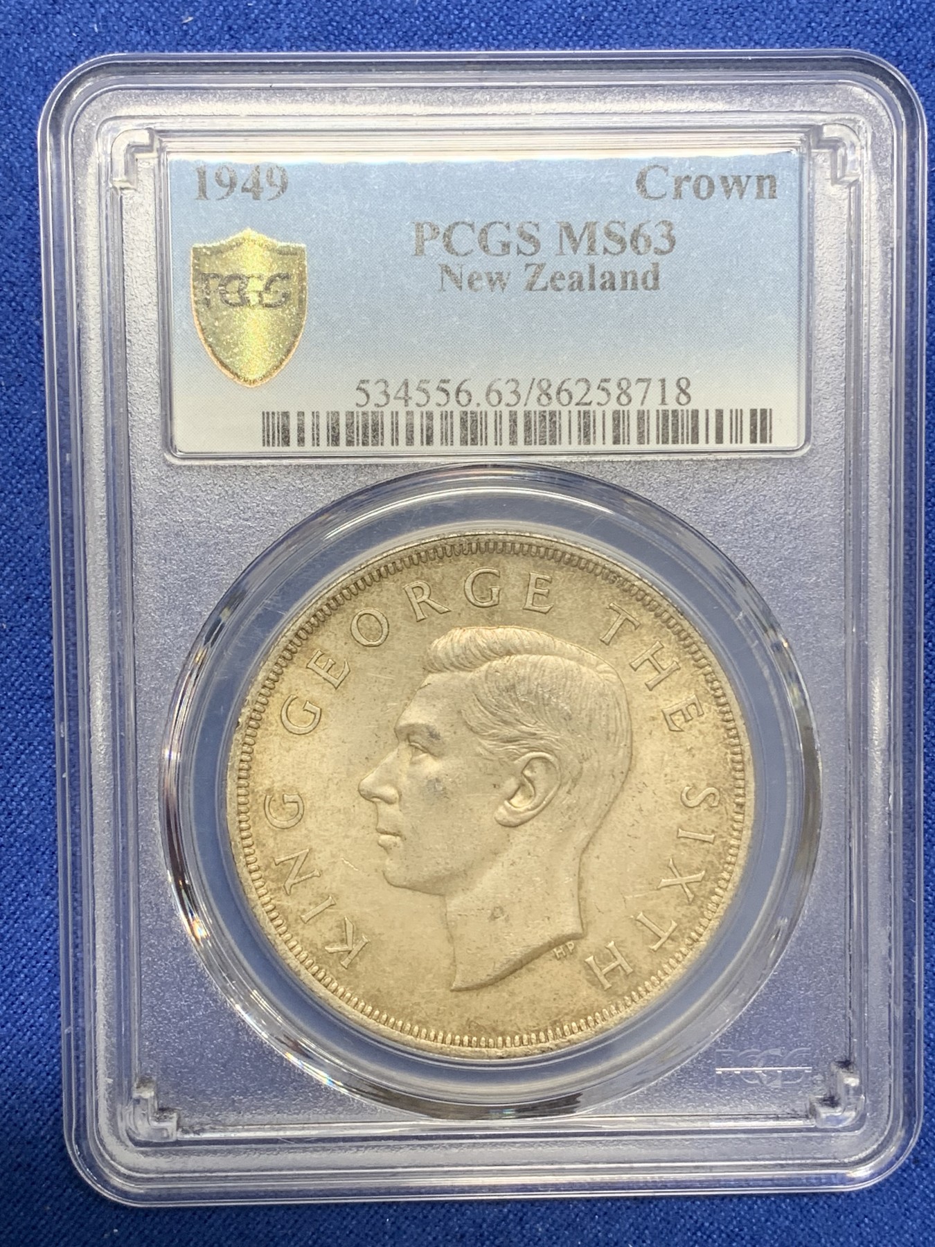 《竞宝斋》第219场-周日，周一 2场 (全场包邮) PCGS-MS63 新西兰1949年乔六头像大银币，灰彩包浆
