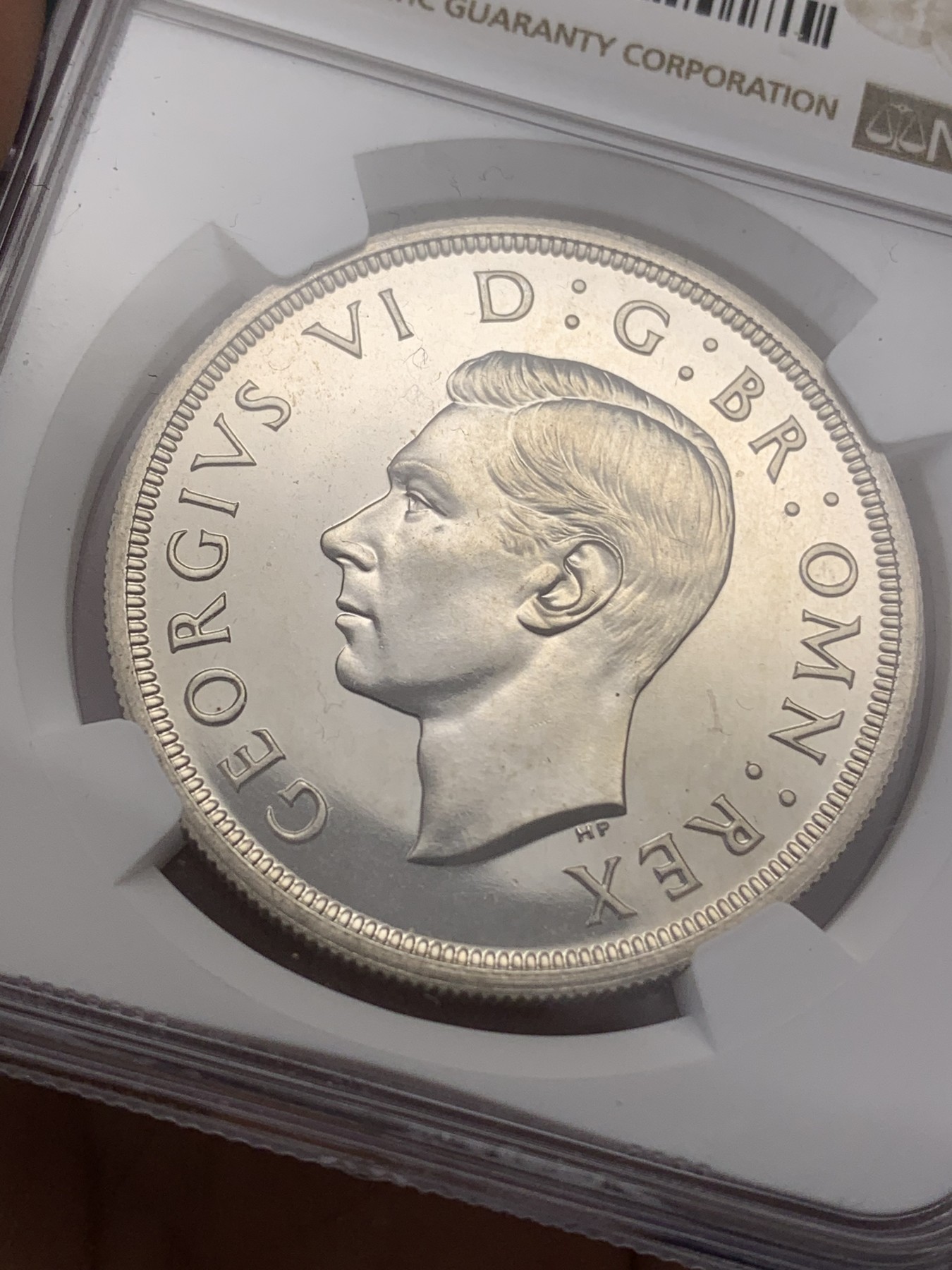 《竞宝斋》第219场-周日，周一 2场 (全场包邮) NGC-PF65 英国1937年乔治六世精致镜面1克朗银币 好品高分难得