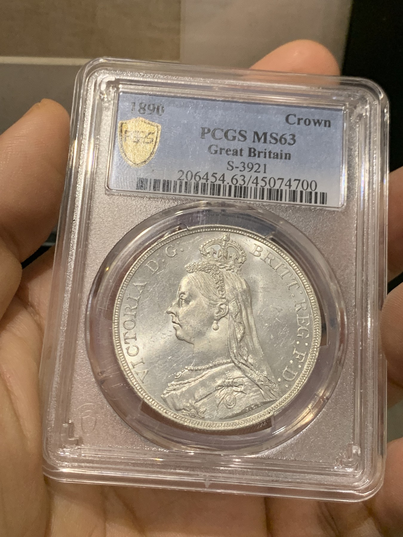 《竞宝斋》第219场-周日，周一 2场 (全场包邮) PCGS-MS63 英国1890年维多利亚高冠马剑 原品车轮光 1890少见年份