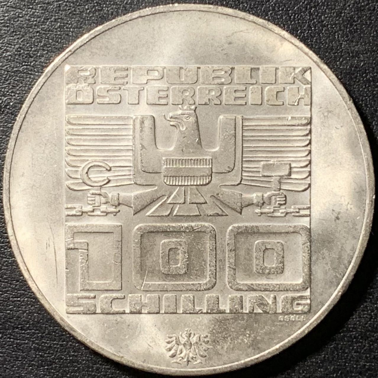 紫瑗钱币——第326期拍卖 奥地利 1976年 因斯布鲁克冬奥运 会标 100先令 24克 0.64银 UNC