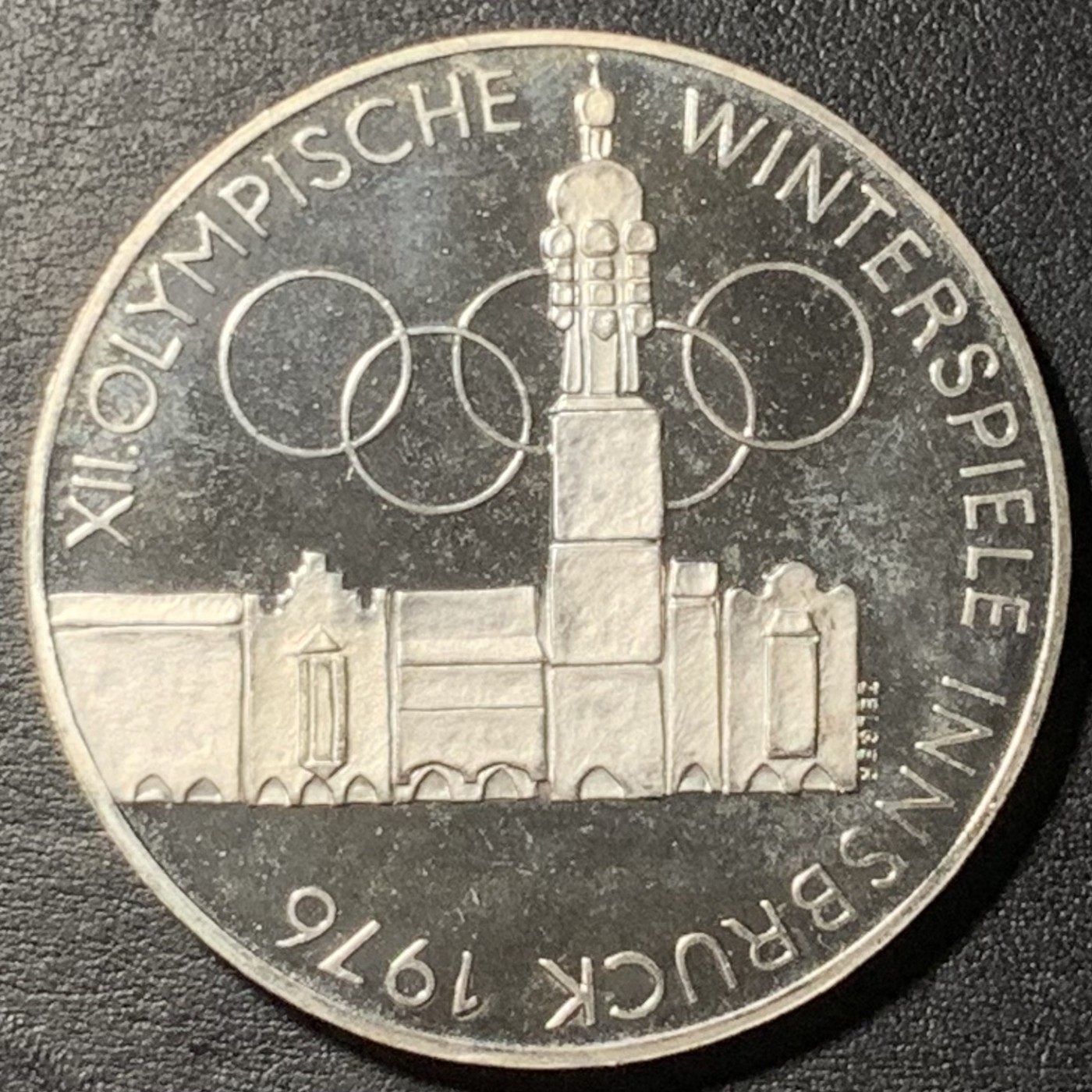 紫瑗钱币——第329期拍卖 奥地利 1976年 因斯布鲁克冬奥运 主会场 100先令 24克 0.64银 精制