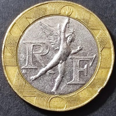 231202  法国10法郎 小天使双色币23mm年份随机发货